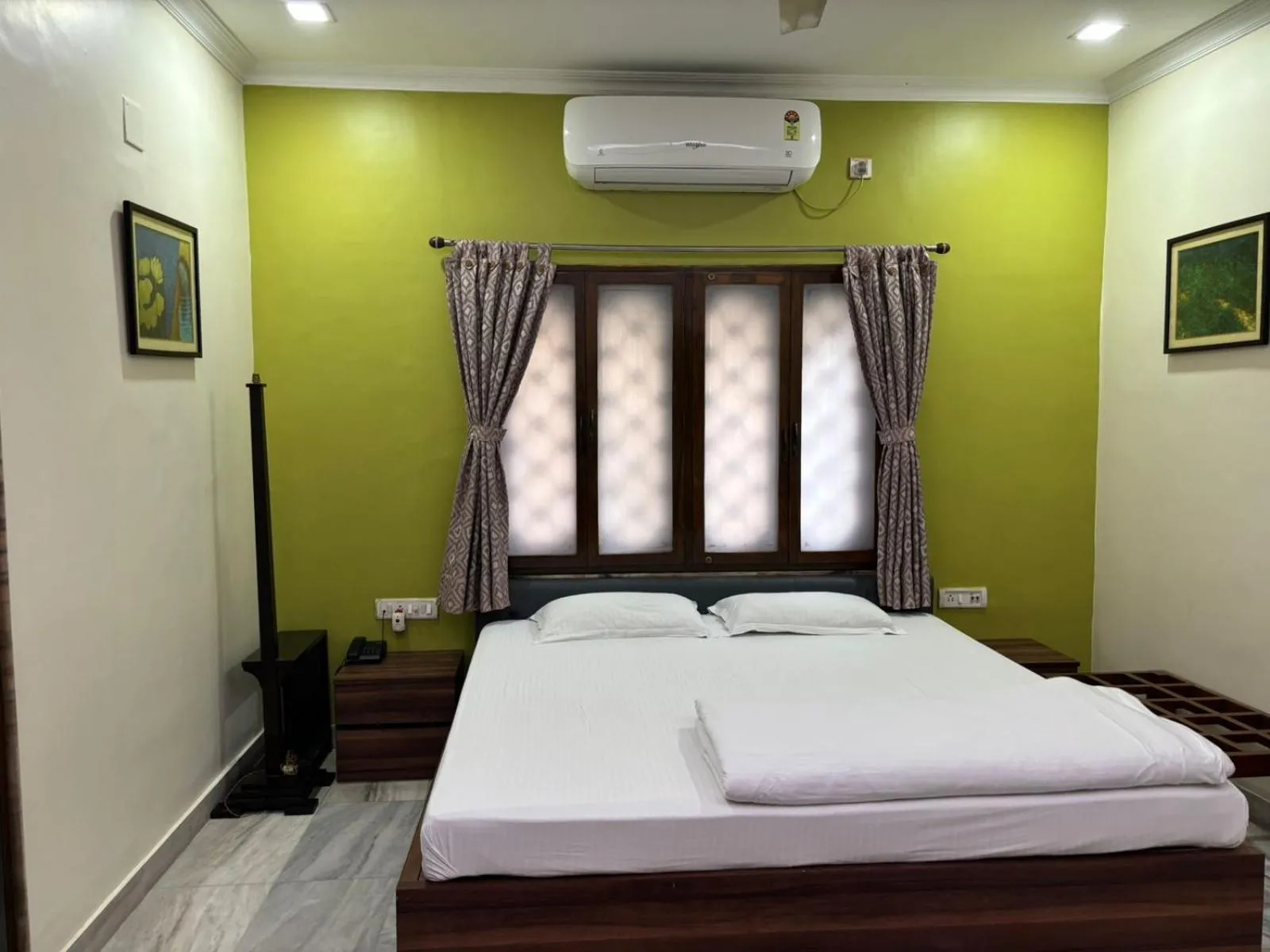 Bed in Om Sai Villa Guesthouse
