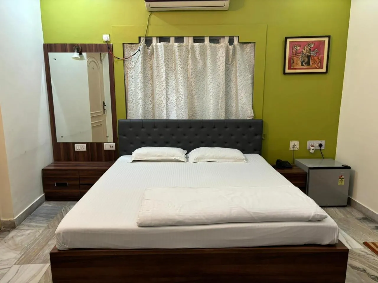 Bed in Om Sai Villa Guesthouse