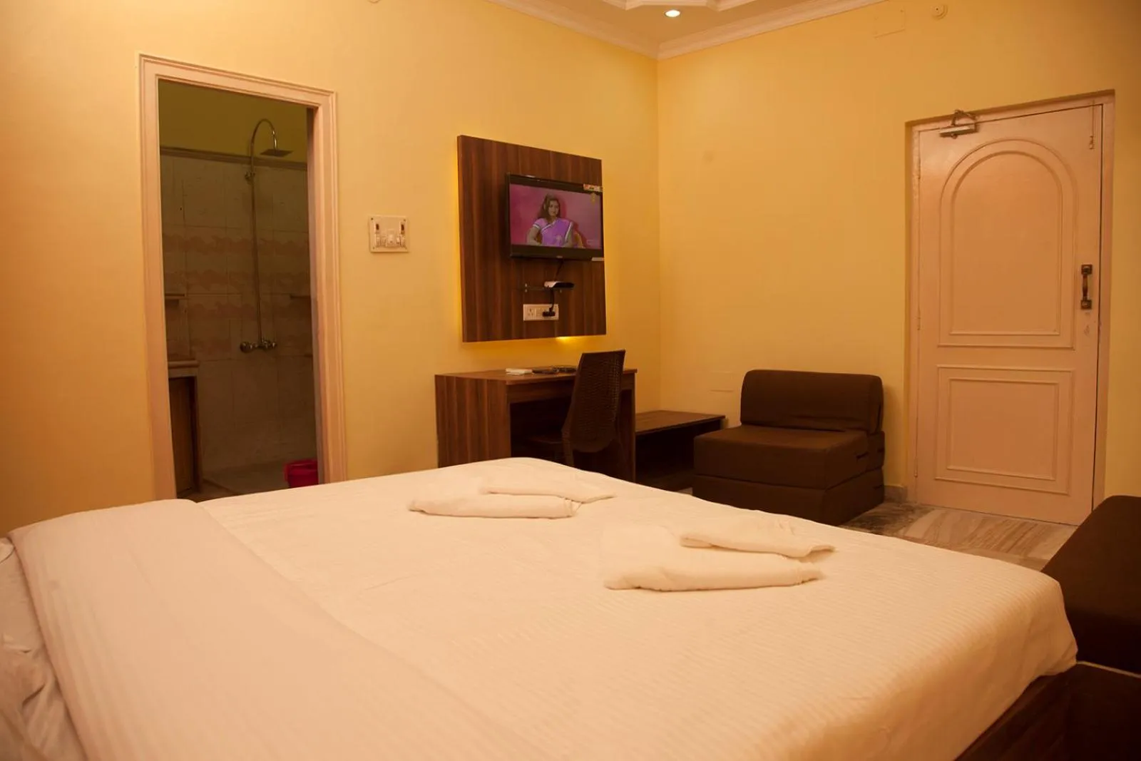 Bed in Om Sai Villa Guesthouse