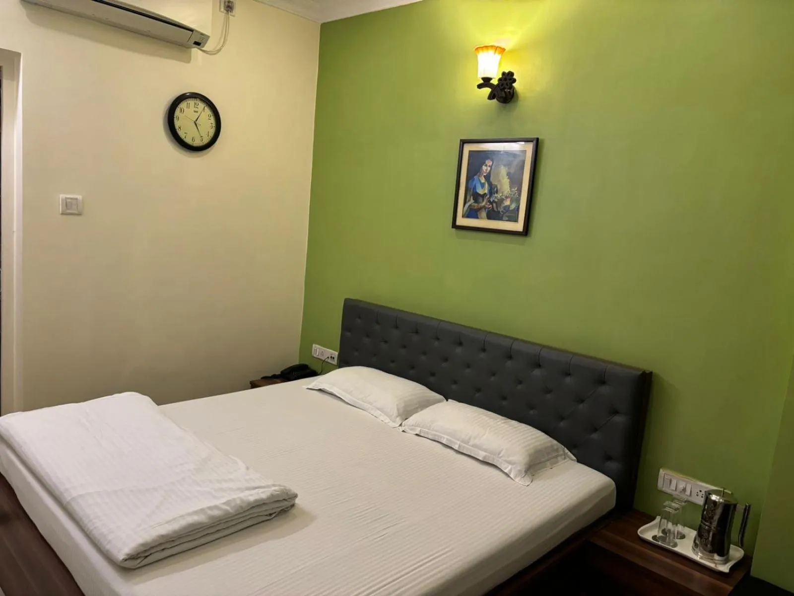 Bed in Om Sai Villa Guesthouse