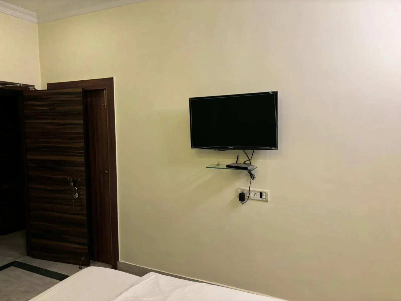 Bed in Om Sai Villa Guesthouse