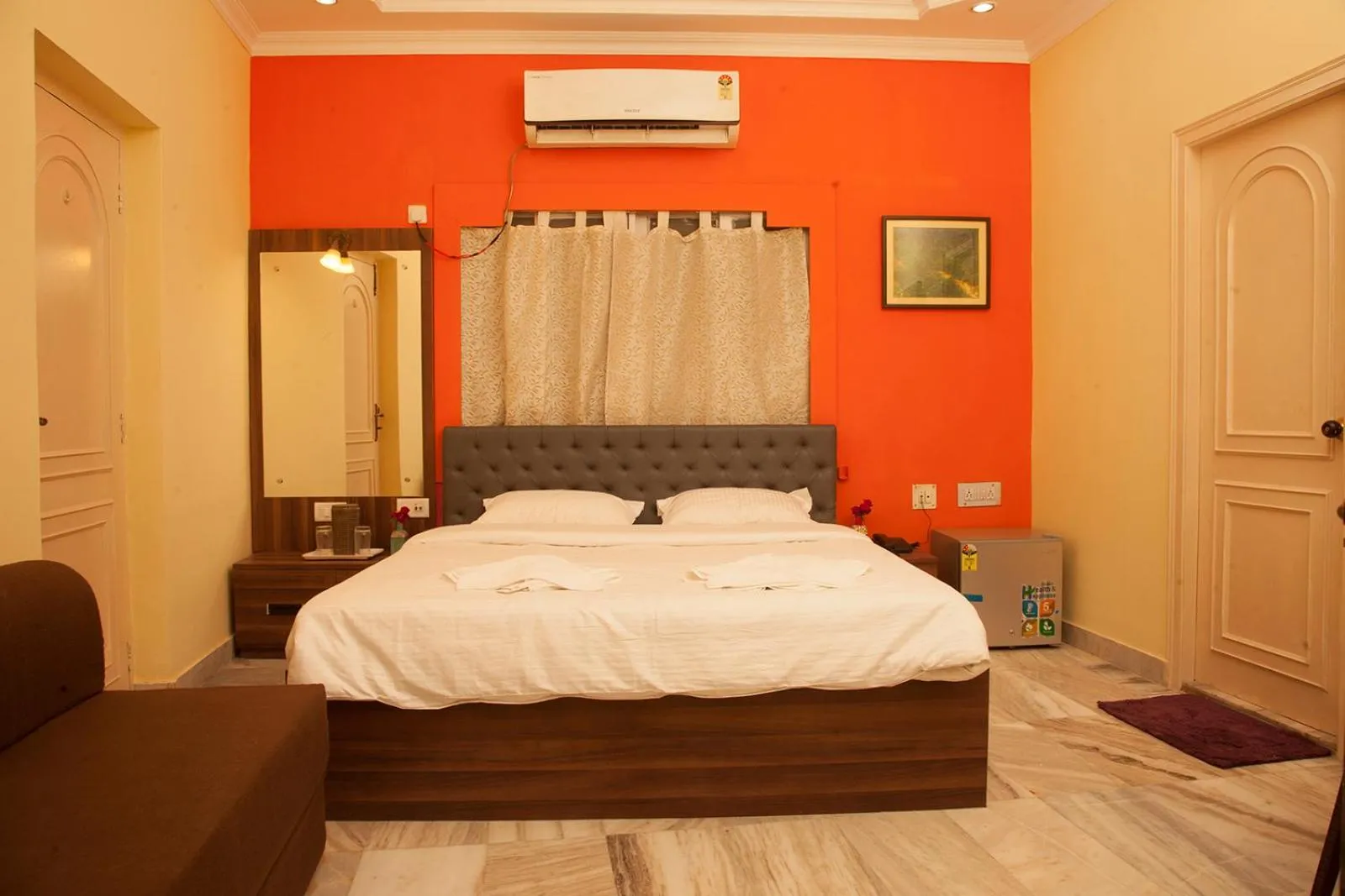 Bed in Om Sai Villa Guesthouse