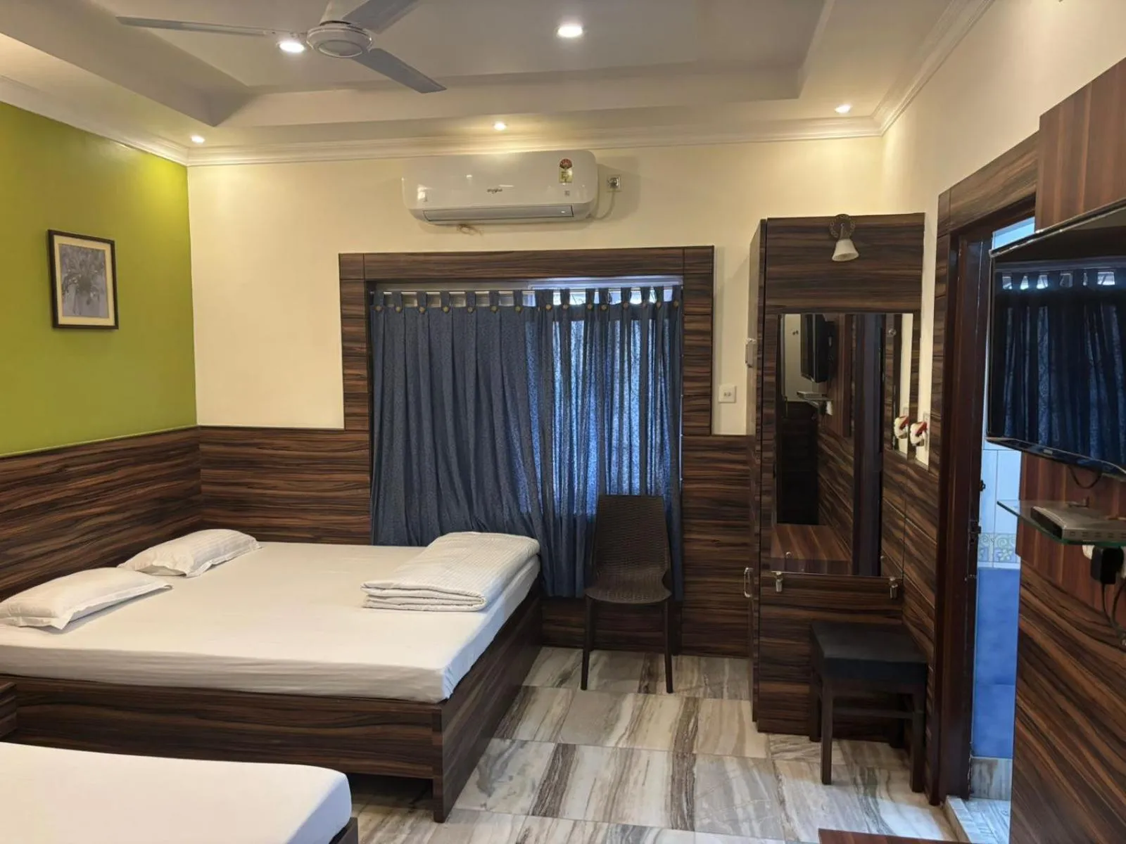 Bed in Om Sai Villa Guesthouse