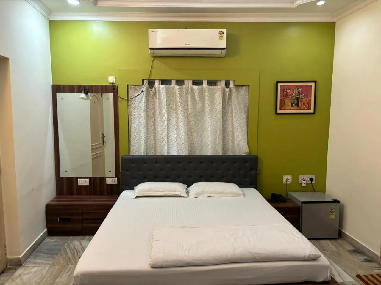Bed in Om Sai Villa Guesthouse