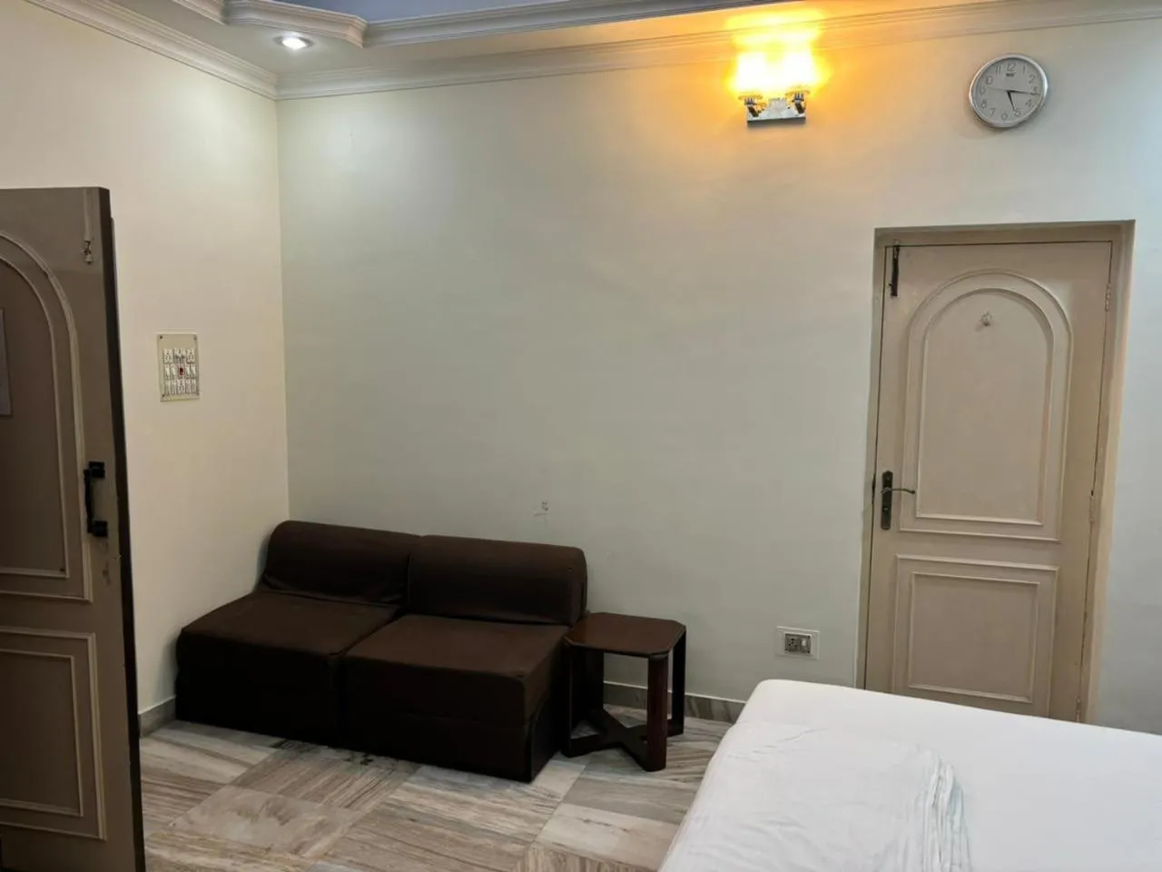 Bed in Om Sai Villa Guesthouse