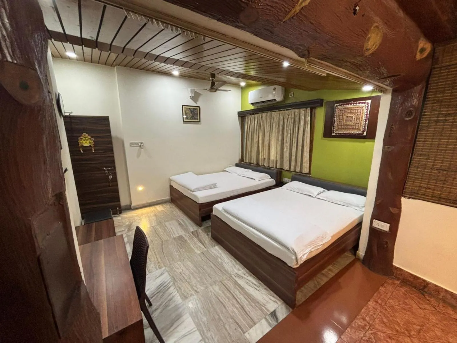 Bed in Om Sai Villa Guesthouse