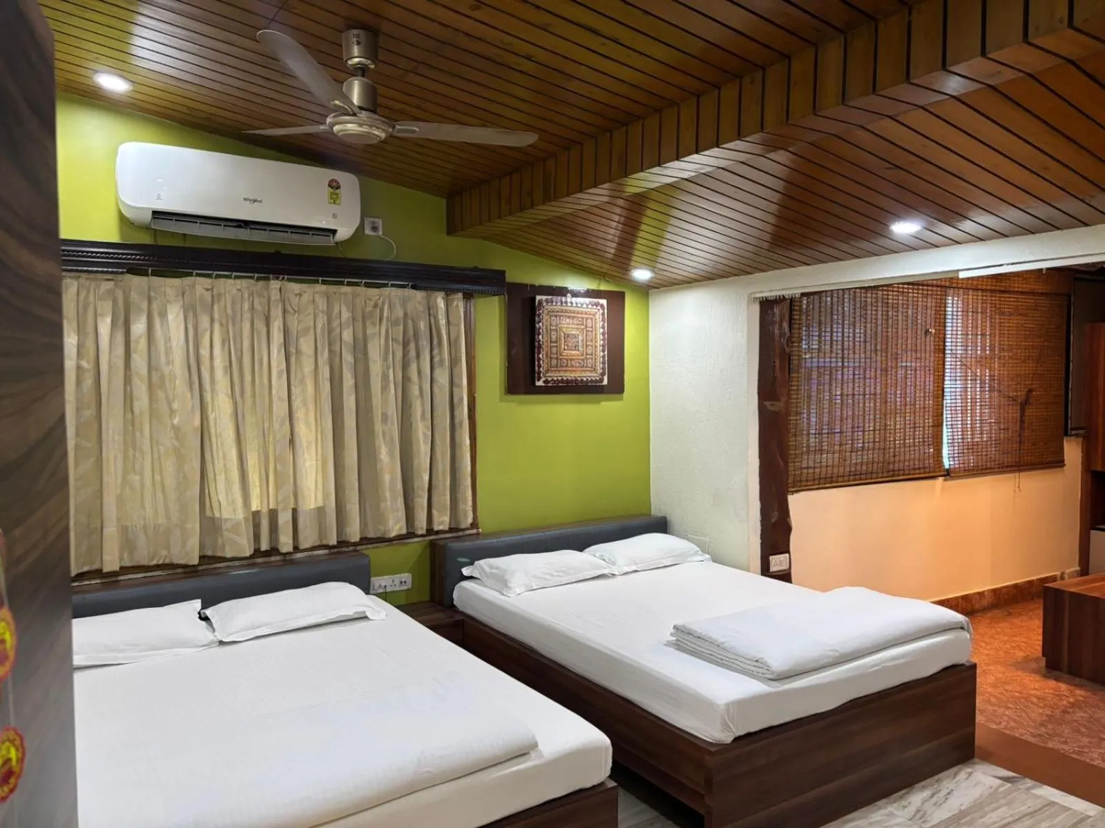 Bed in Om Sai Villa Guesthouse