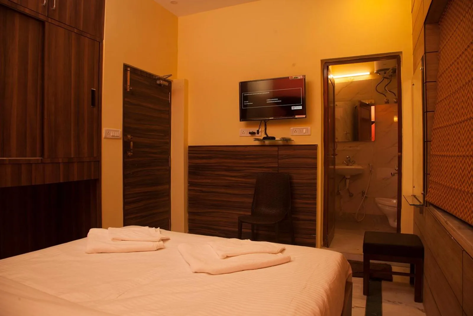 Bed in Om Sai Villa Guesthouse