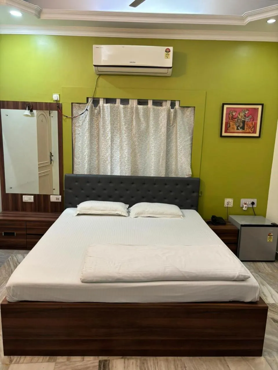 Bed in Om Sai Villa Guesthouse