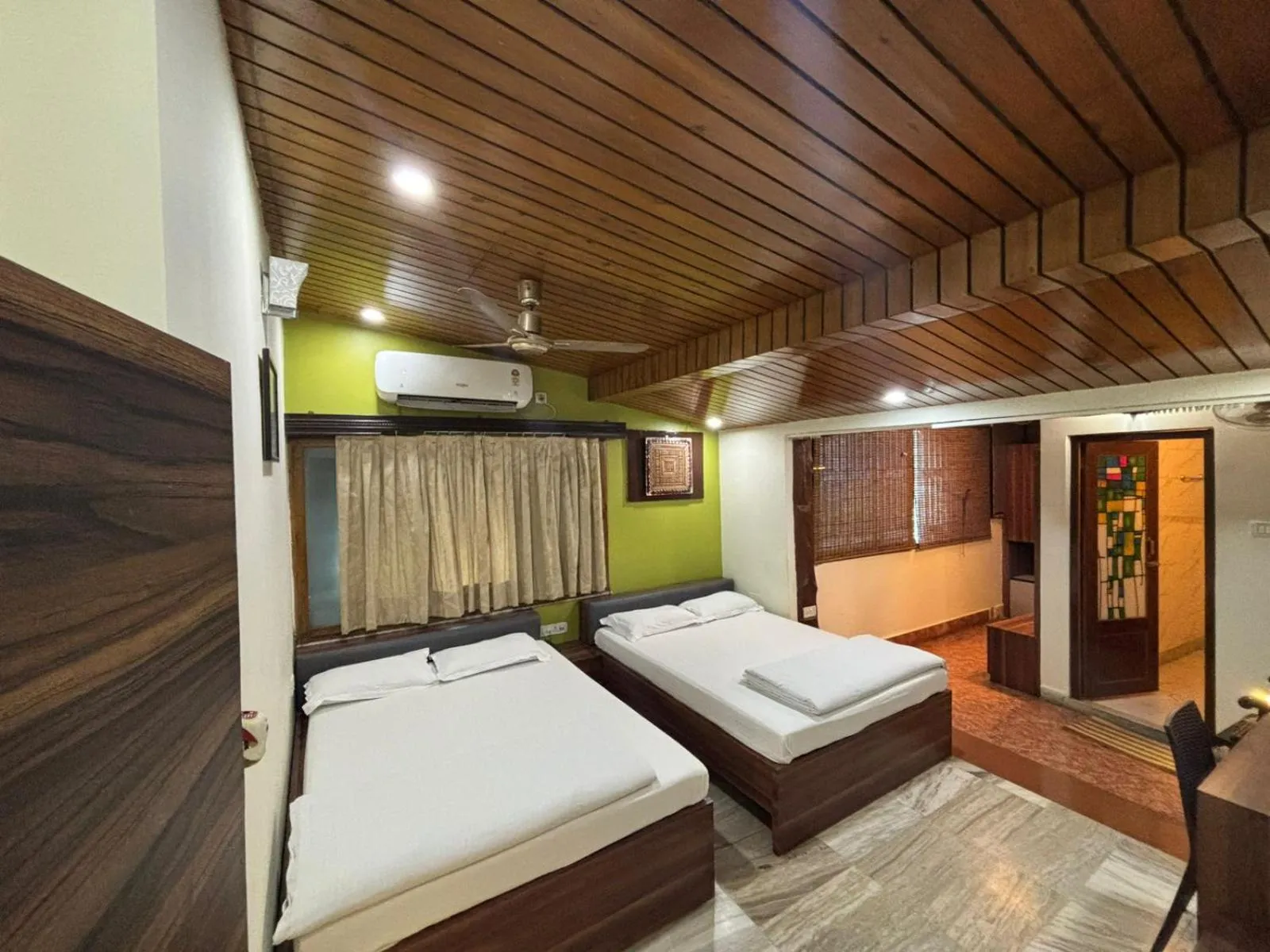 Bed in Om Sai Villa Guesthouse