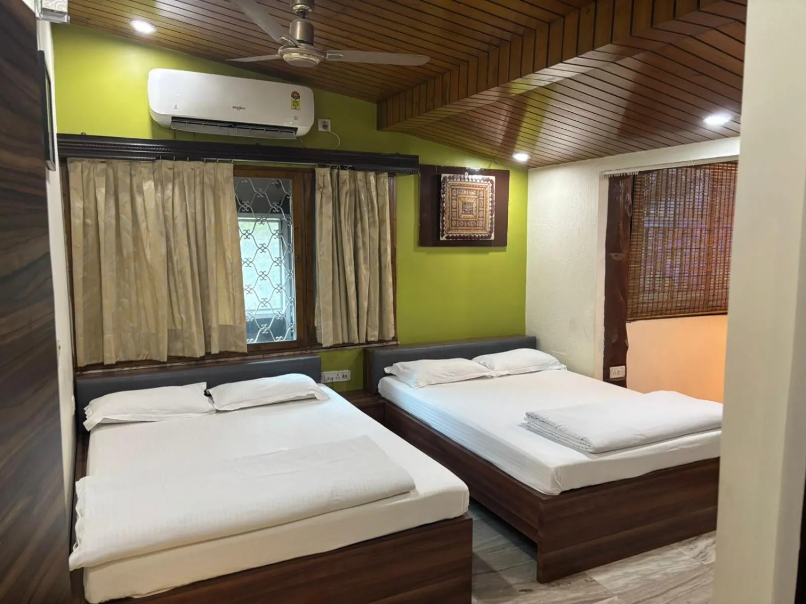 Bed in Om Sai Villa Guesthouse