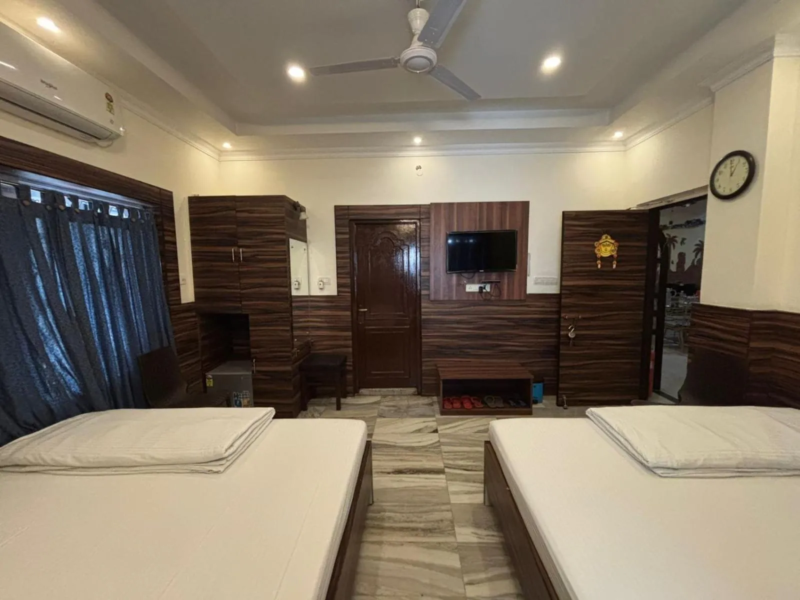 Bed in Om Sai Villa Guesthouse