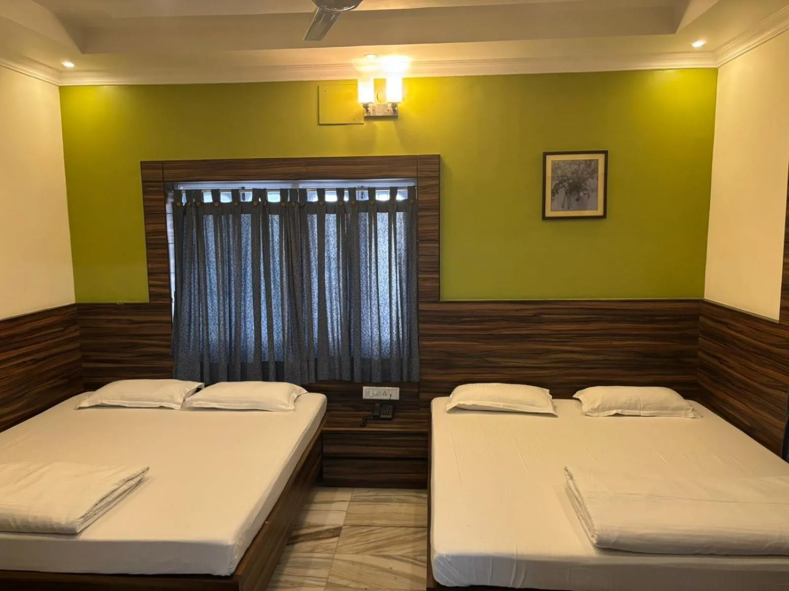 Bed in Om Sai Villa Guesthouse