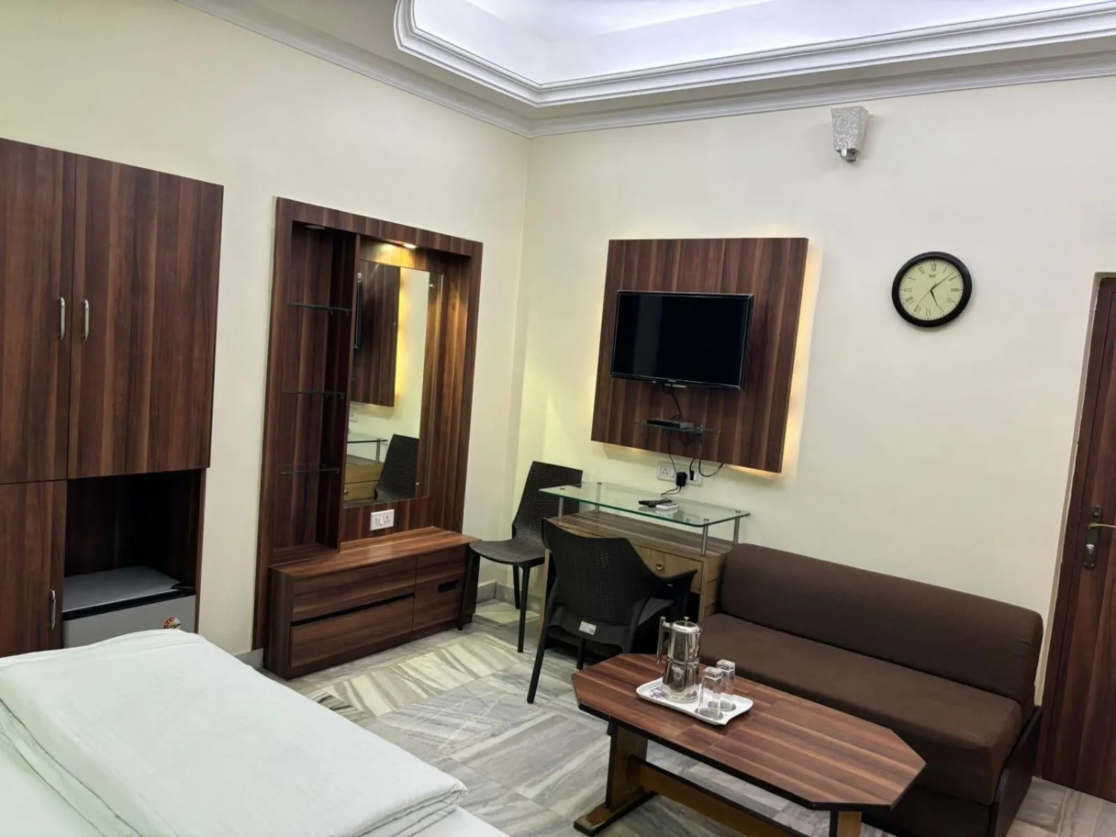 Bed in Om Sai Villa Guesthouse