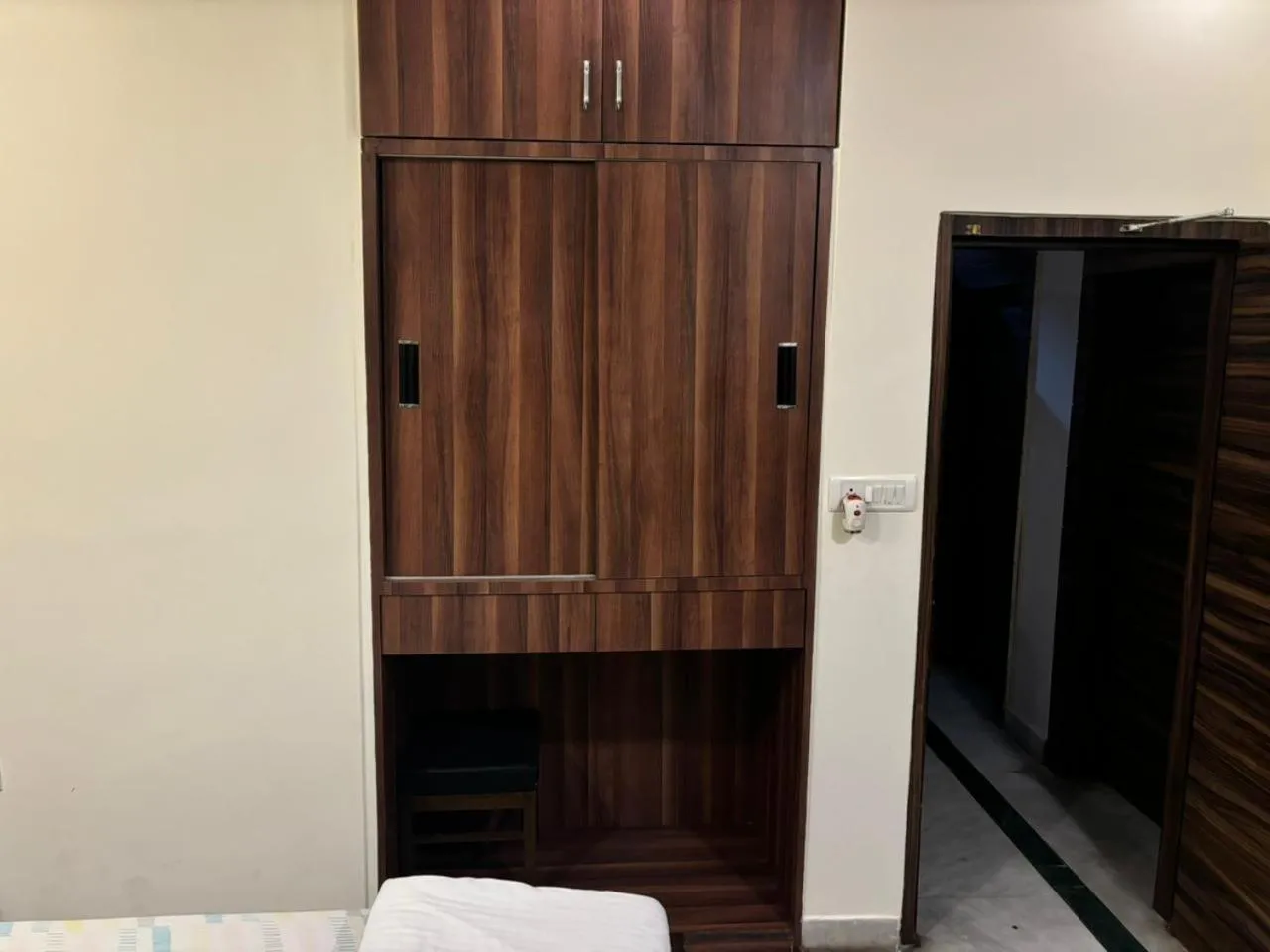 Bed in Om Sai Villa Guesthouse