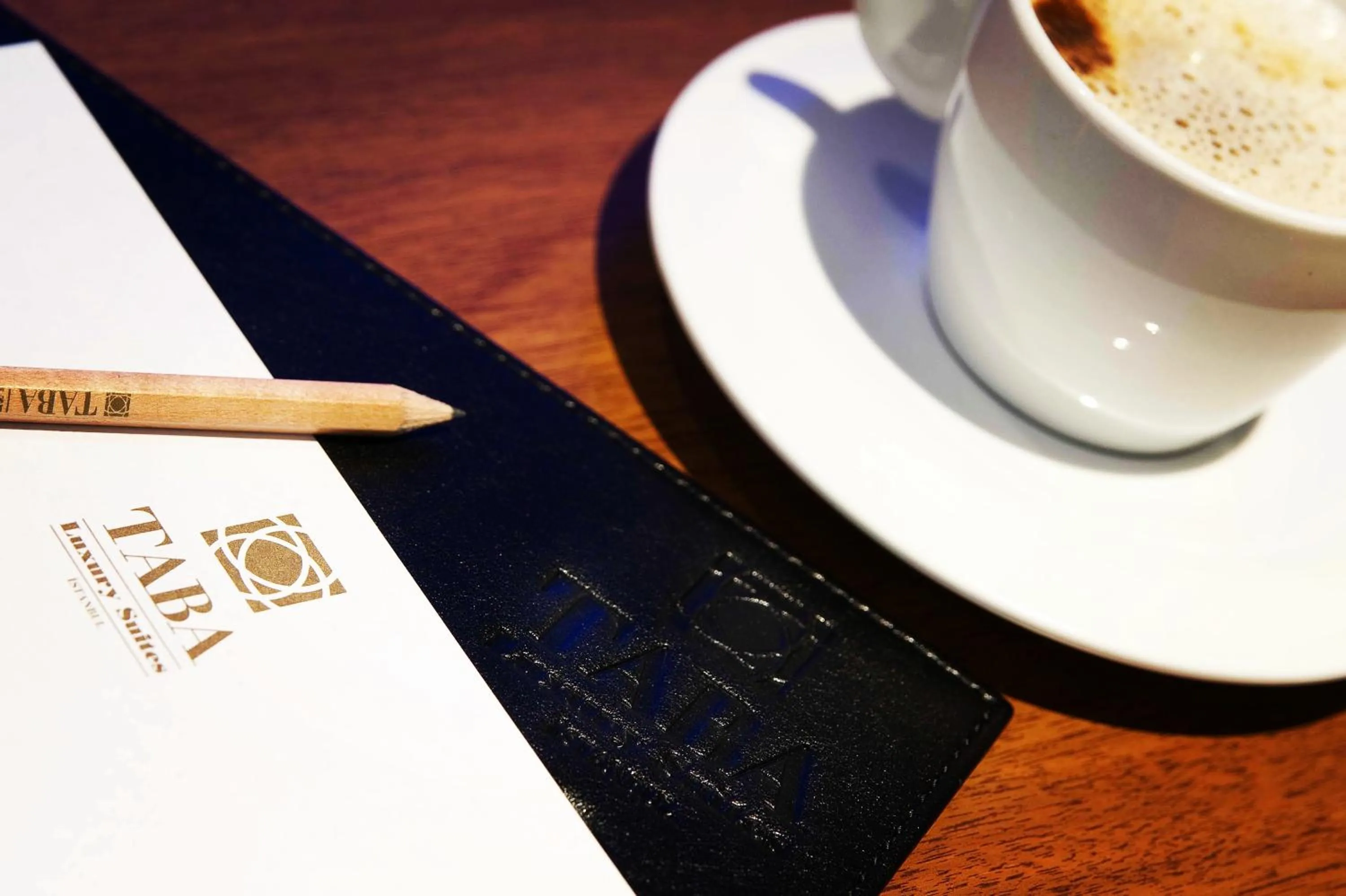 Property logo or sign in Taba Luxury Suites and Hotel