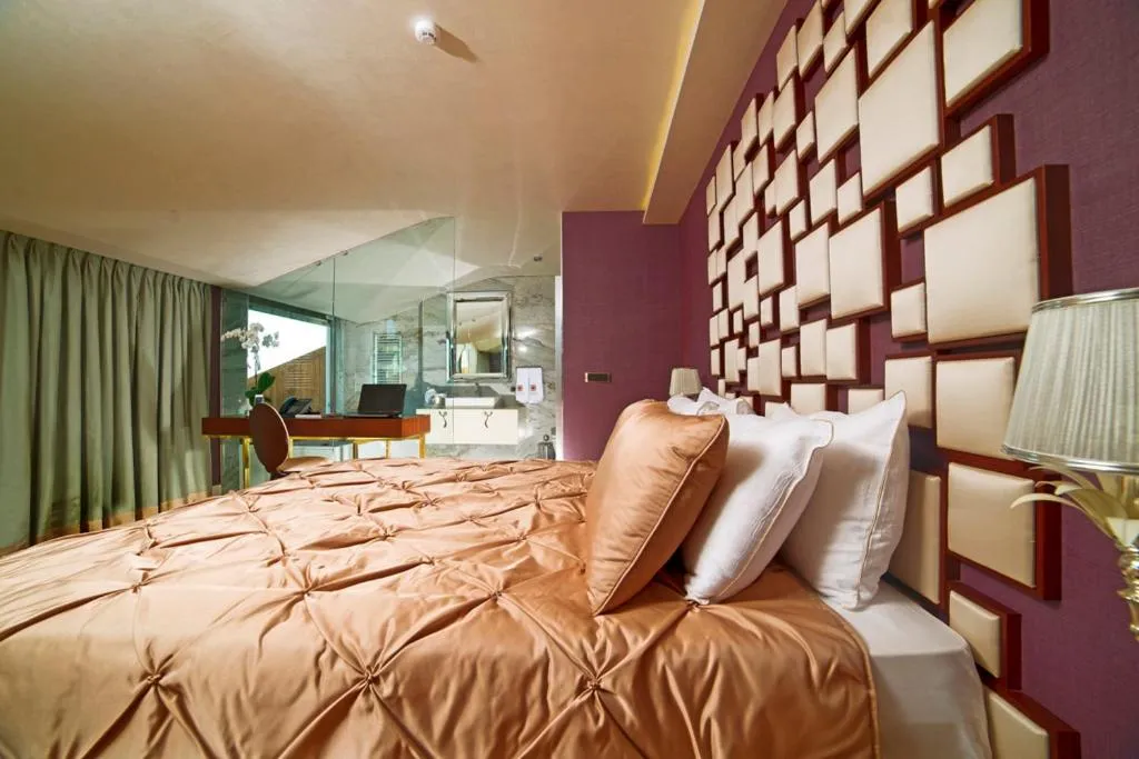 Bed in Taba Luxury Suites and Hotel