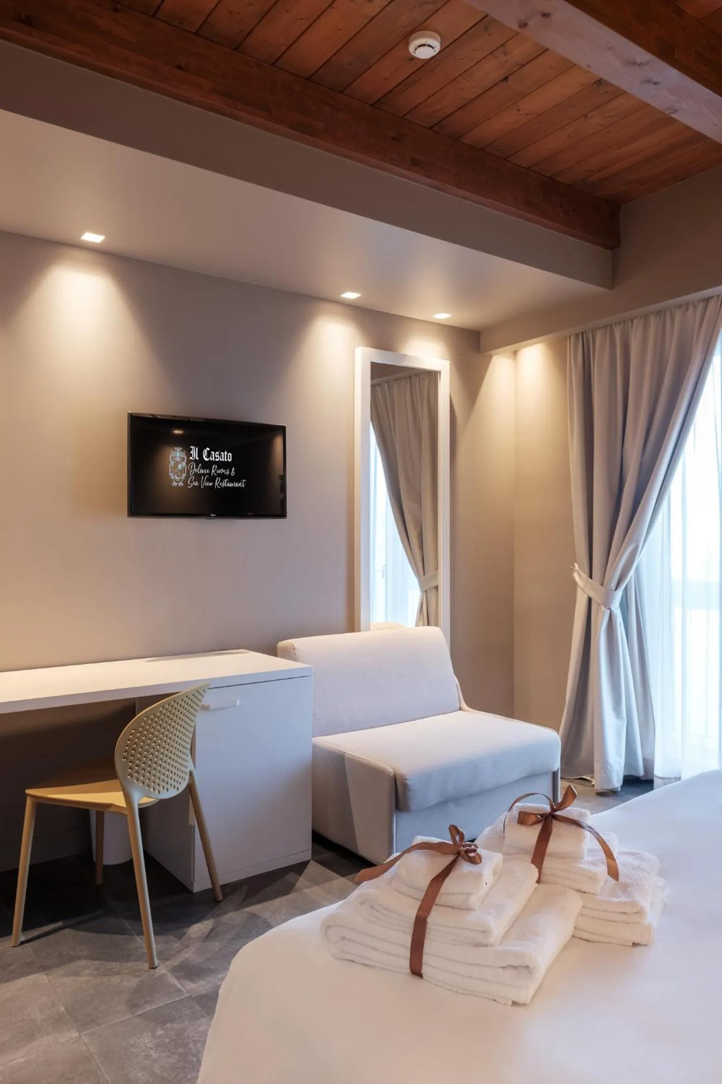 Bed in Il Casato Deluxe Rooms
