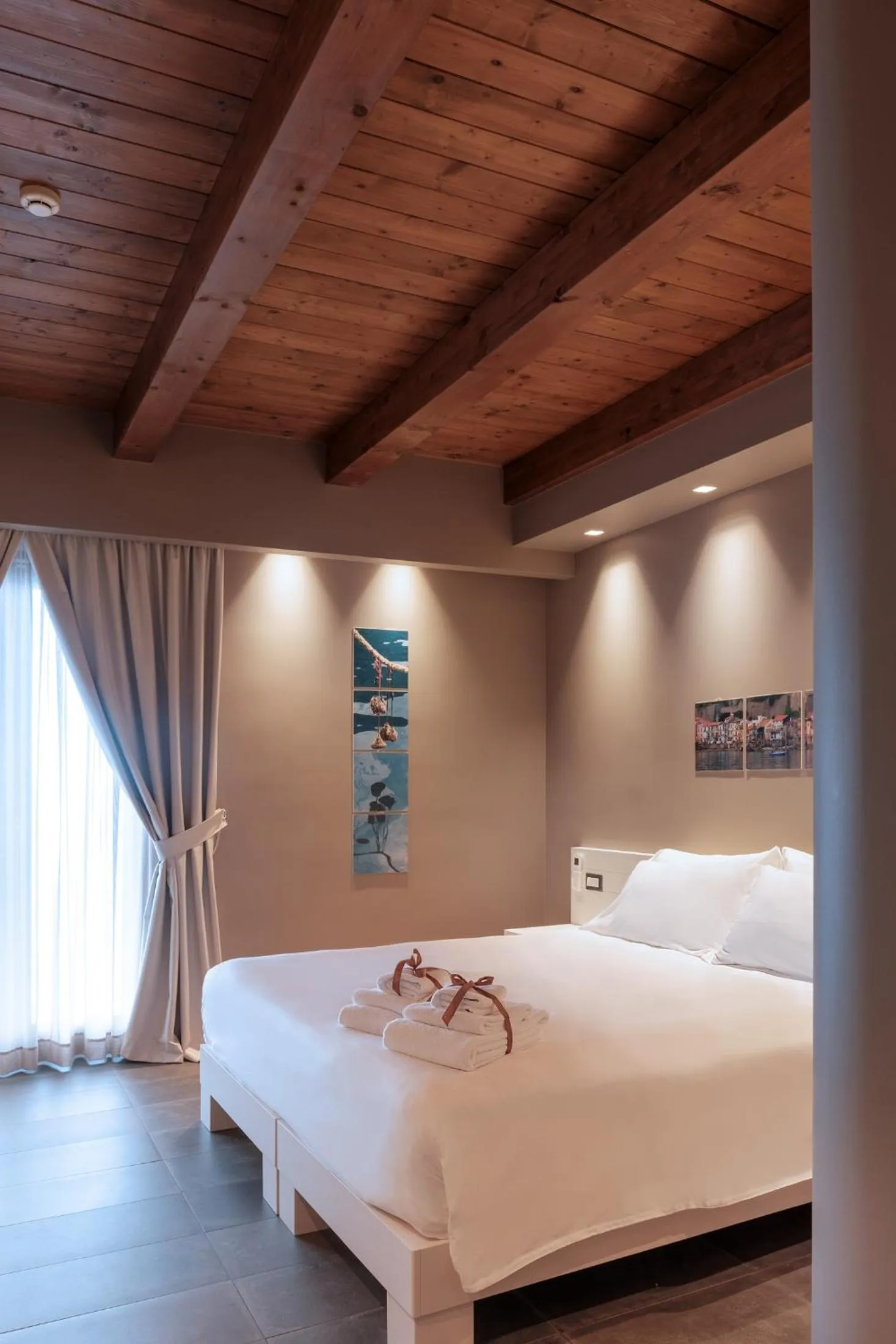 Bed in Il Casato Deluxe Rooms