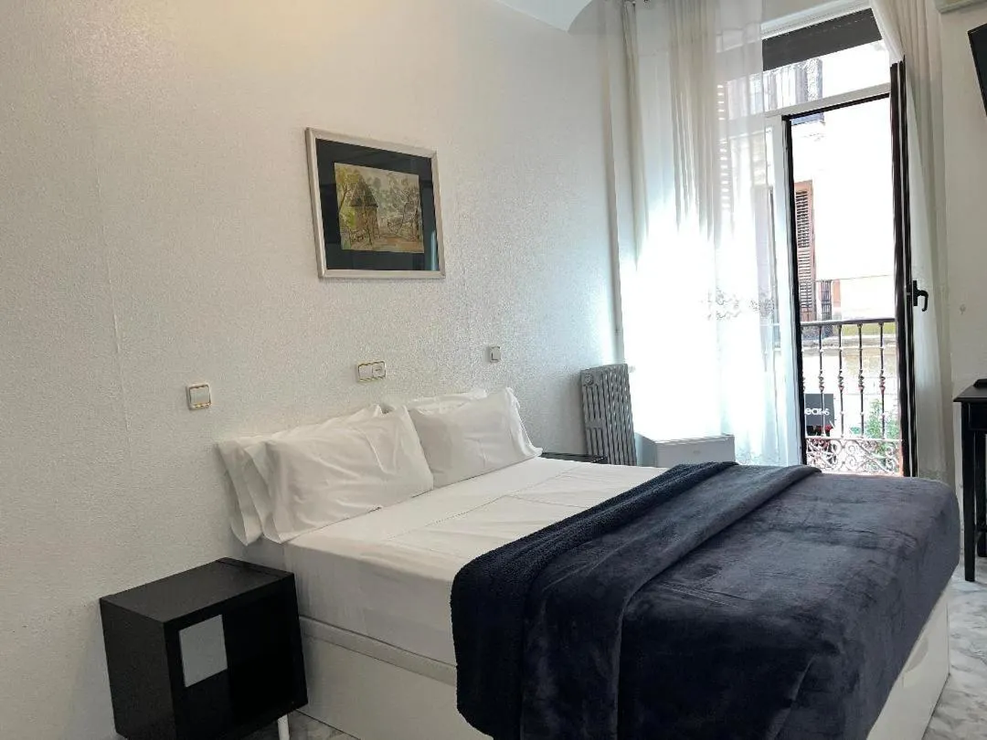 Bed in Hostal Palacios Fuencarral