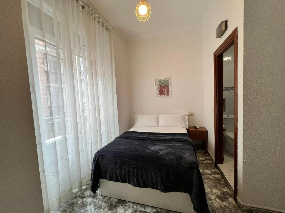 Bed in Hostal Palacios Fuencarral