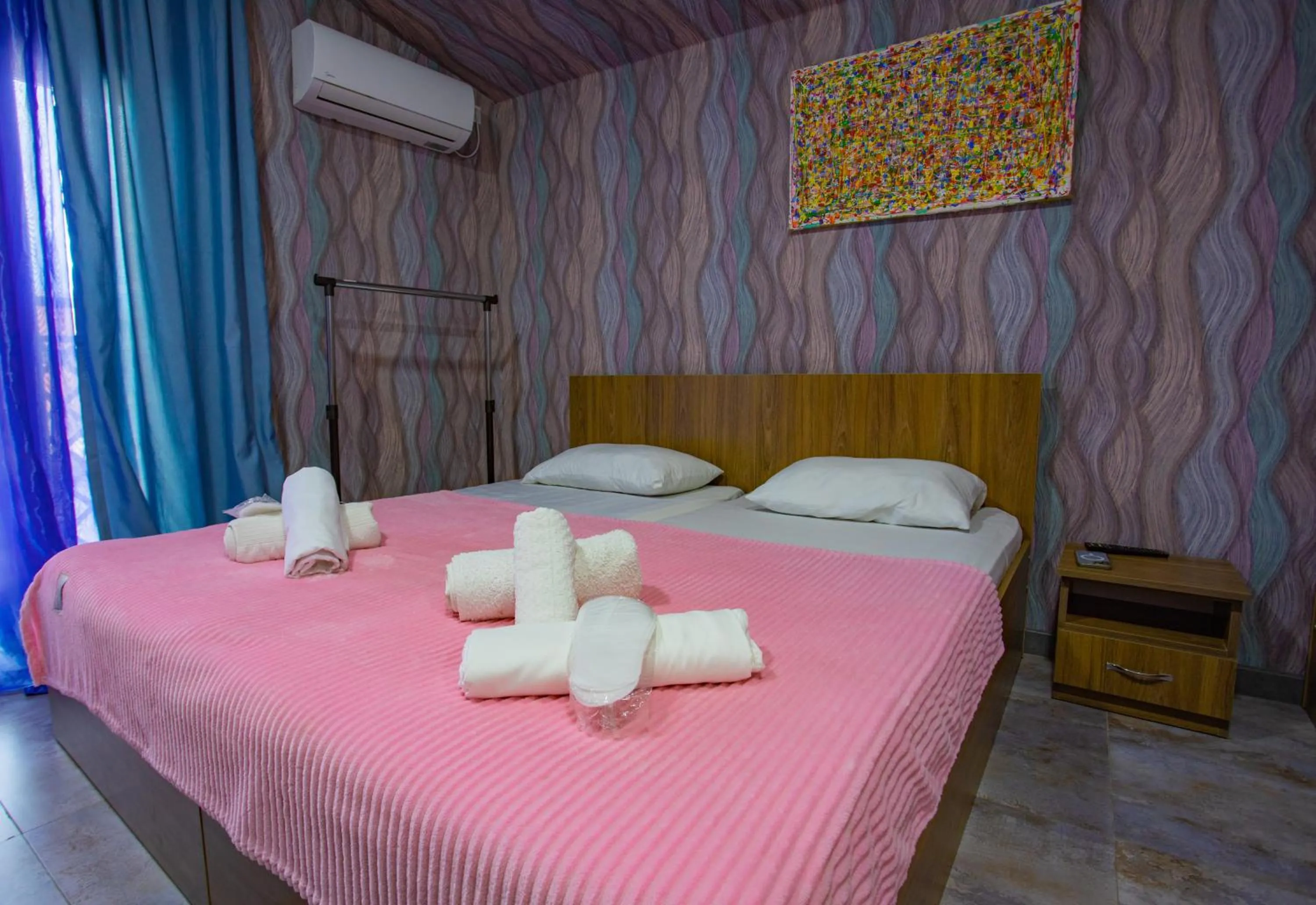 Bed in Hotel Homeland