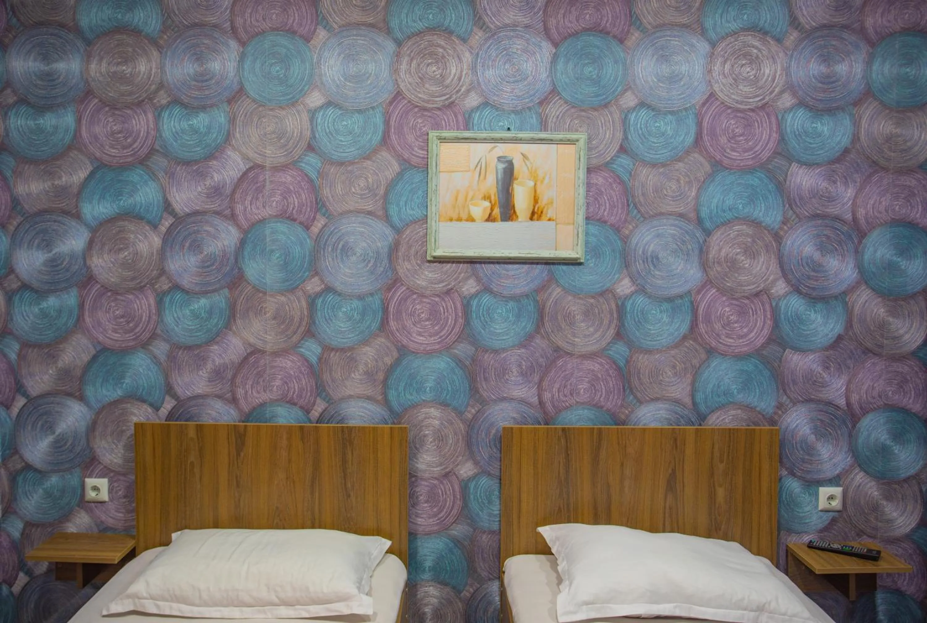 Bed in Hotel Homeland