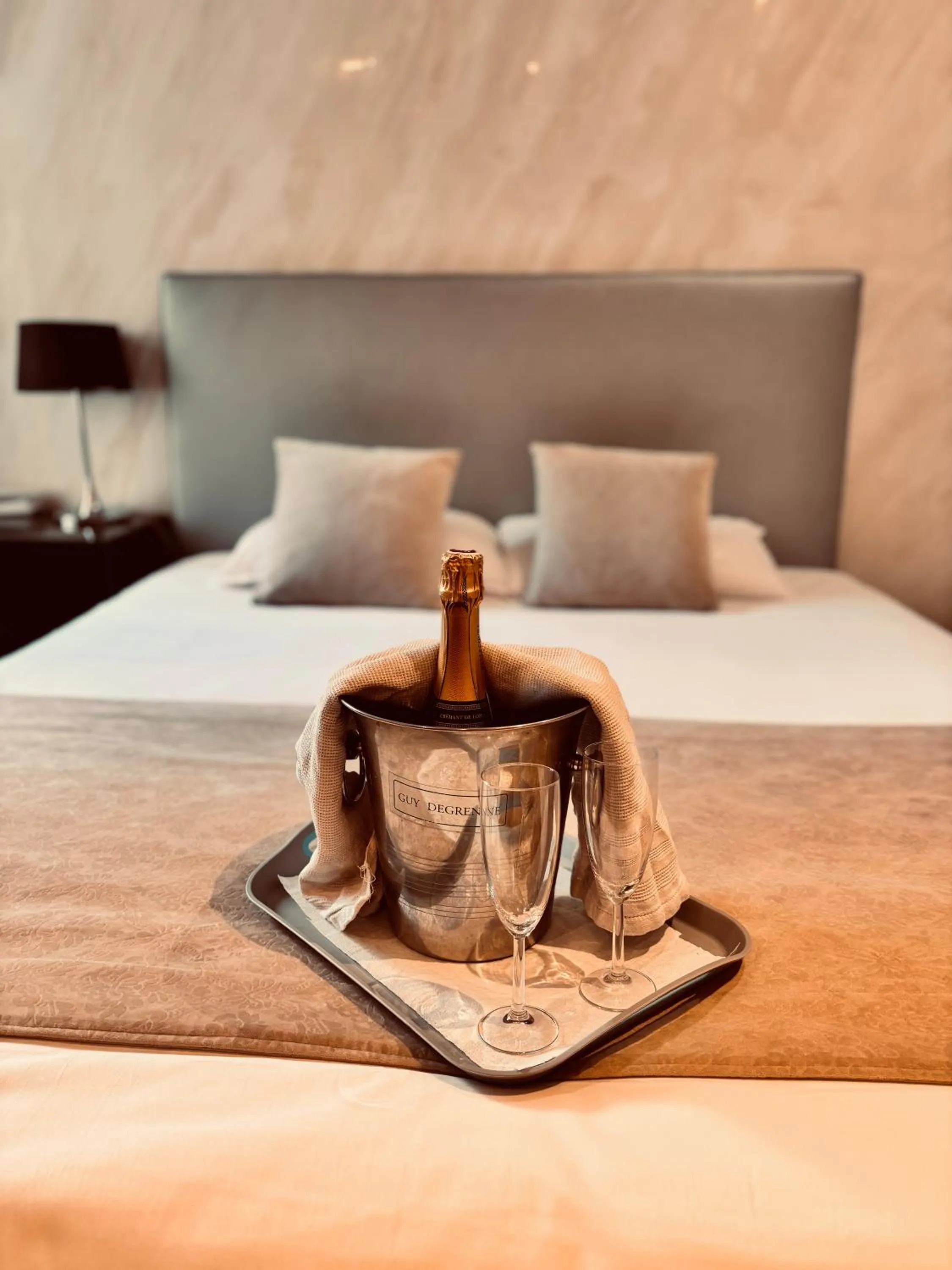 Bed in Logis Hôtel Saint Martin