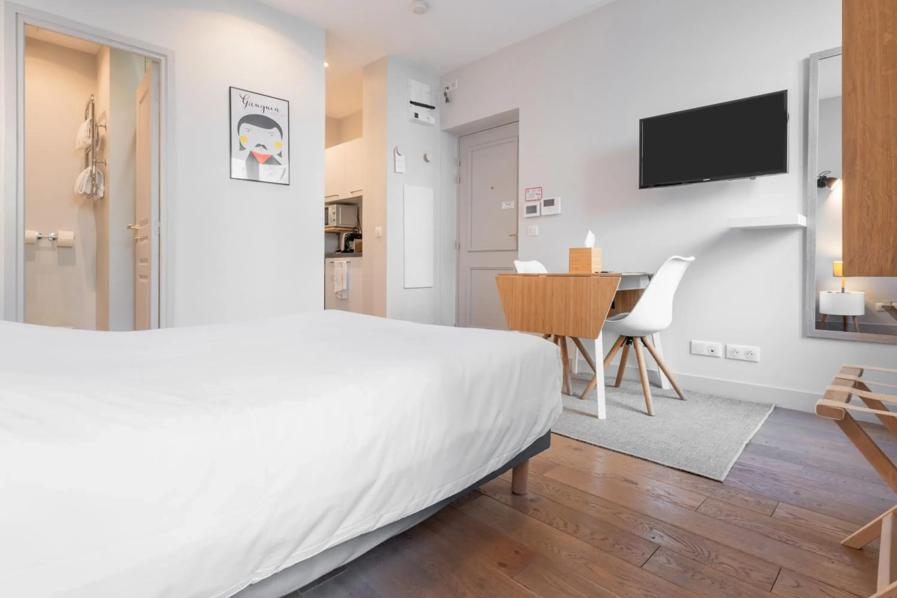 Bed in Apparts de l'Oncle Louis Bed in Apparts de l'Oncle Louis