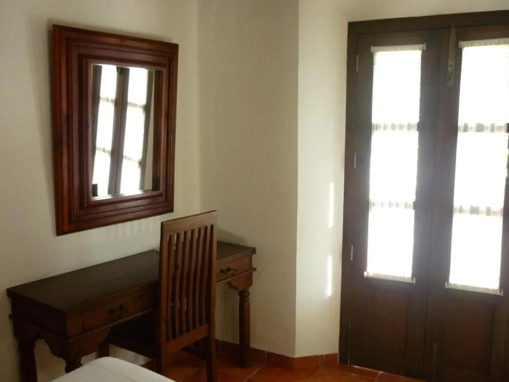 Decorative detail, Bed in Meson del Alferez Coatepec