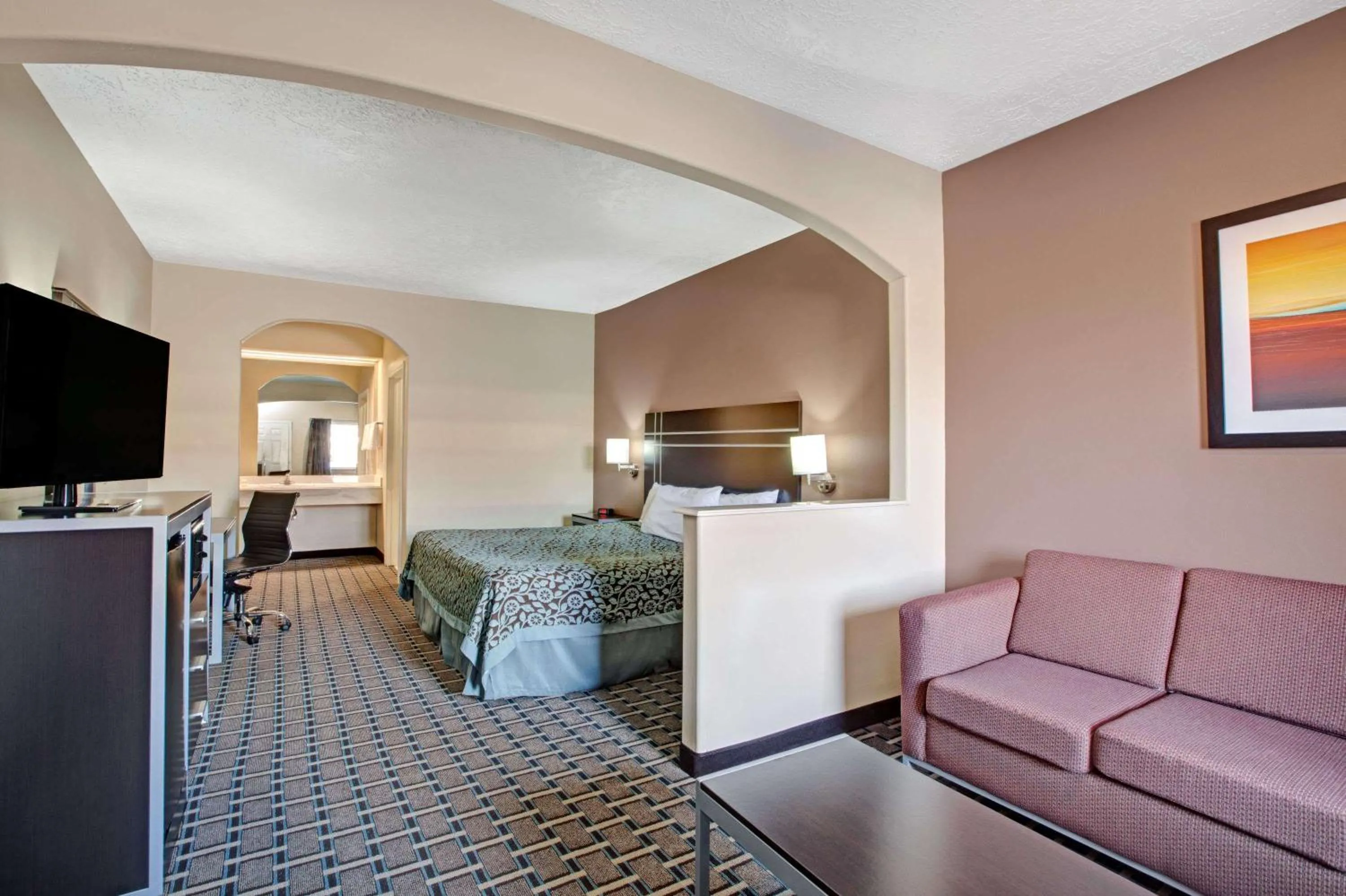 Photo of the whole room, Bed in Days Inn & Suites by Wyndham Houston North - Spring