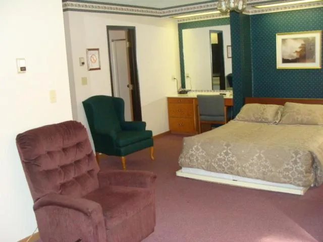 Photo of the whole room, Bed in USA Inns of America