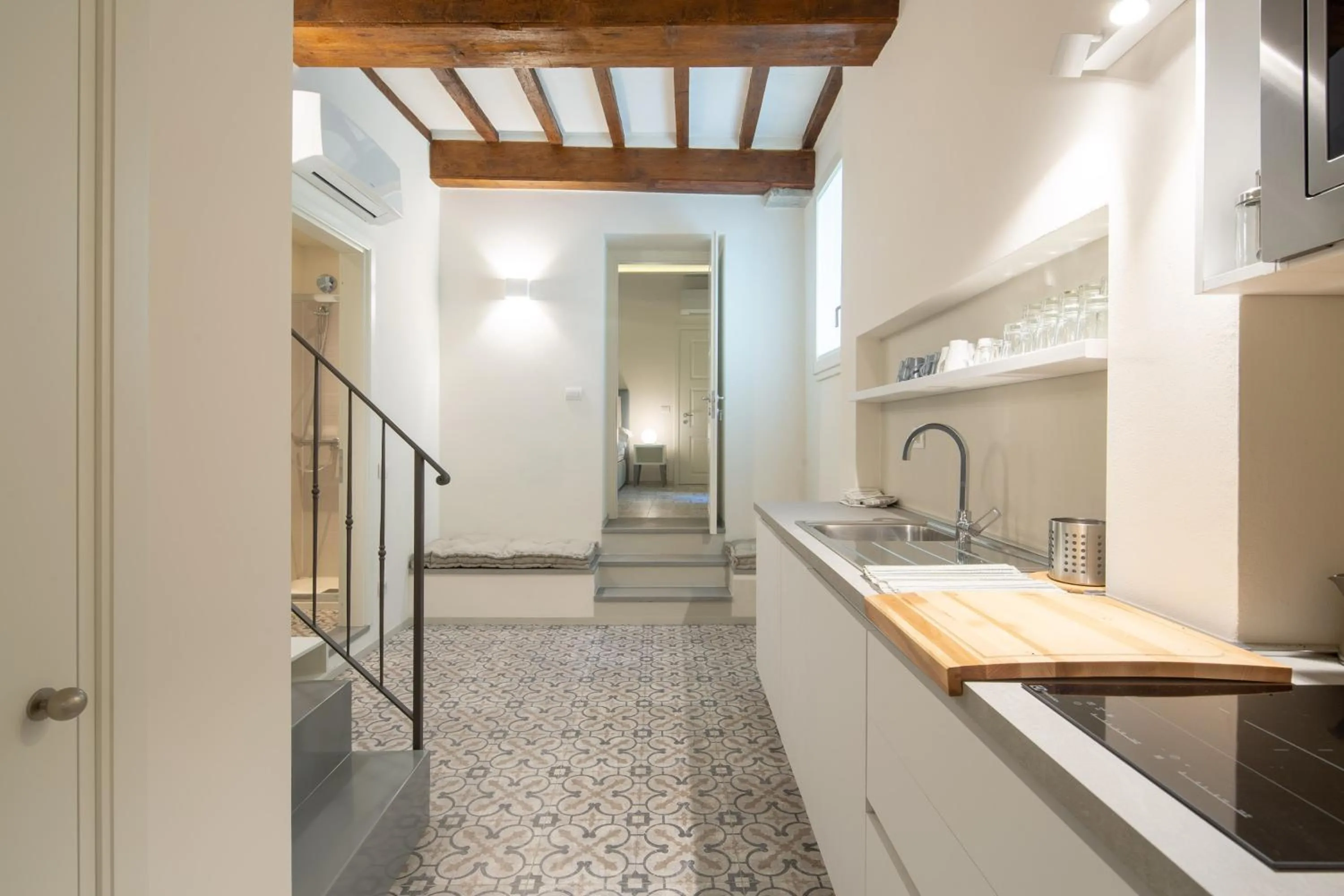 Kitchen or kitchenette in Carapelli Apartments