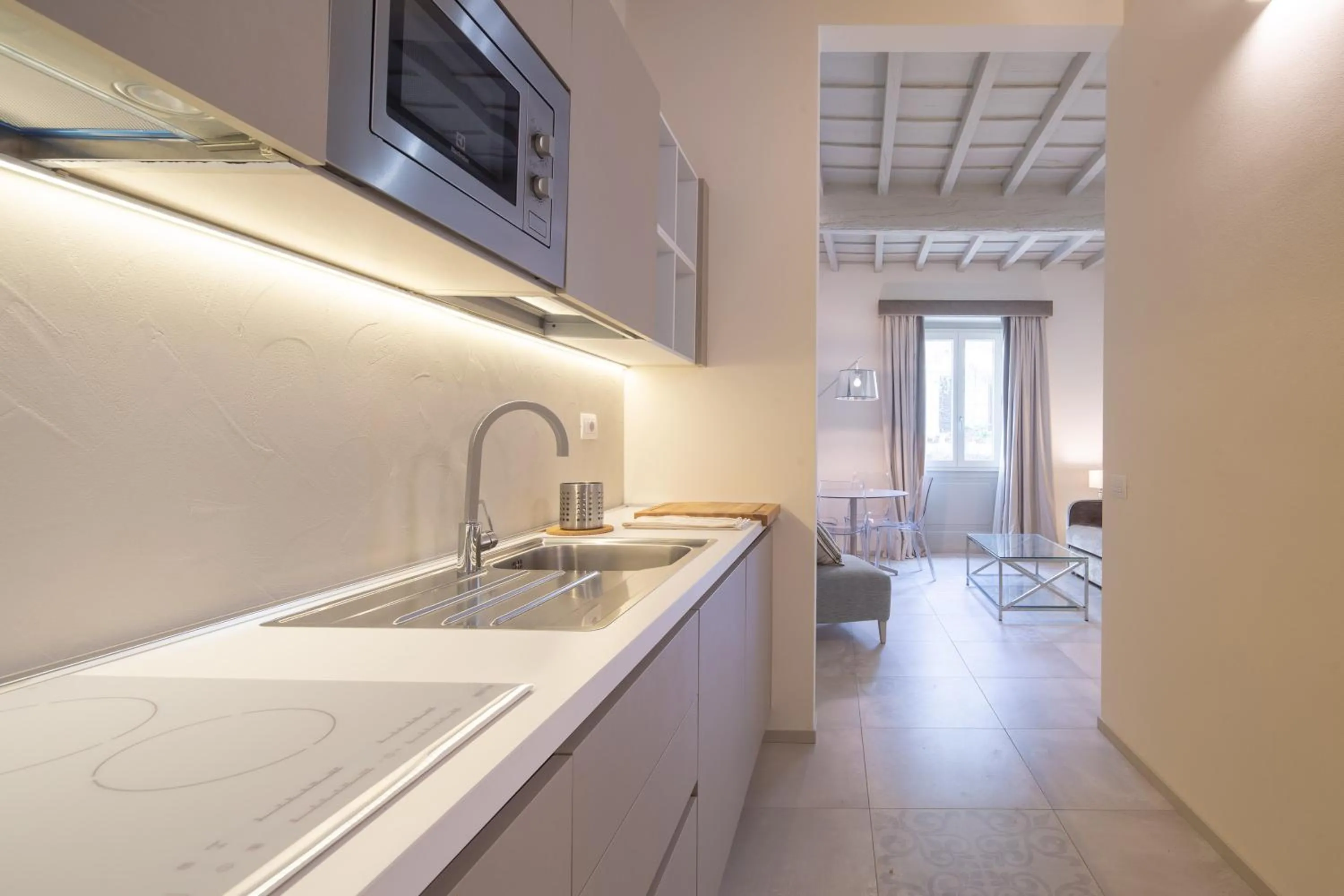 Kitchen or kitchenette in Carapelli Apartments