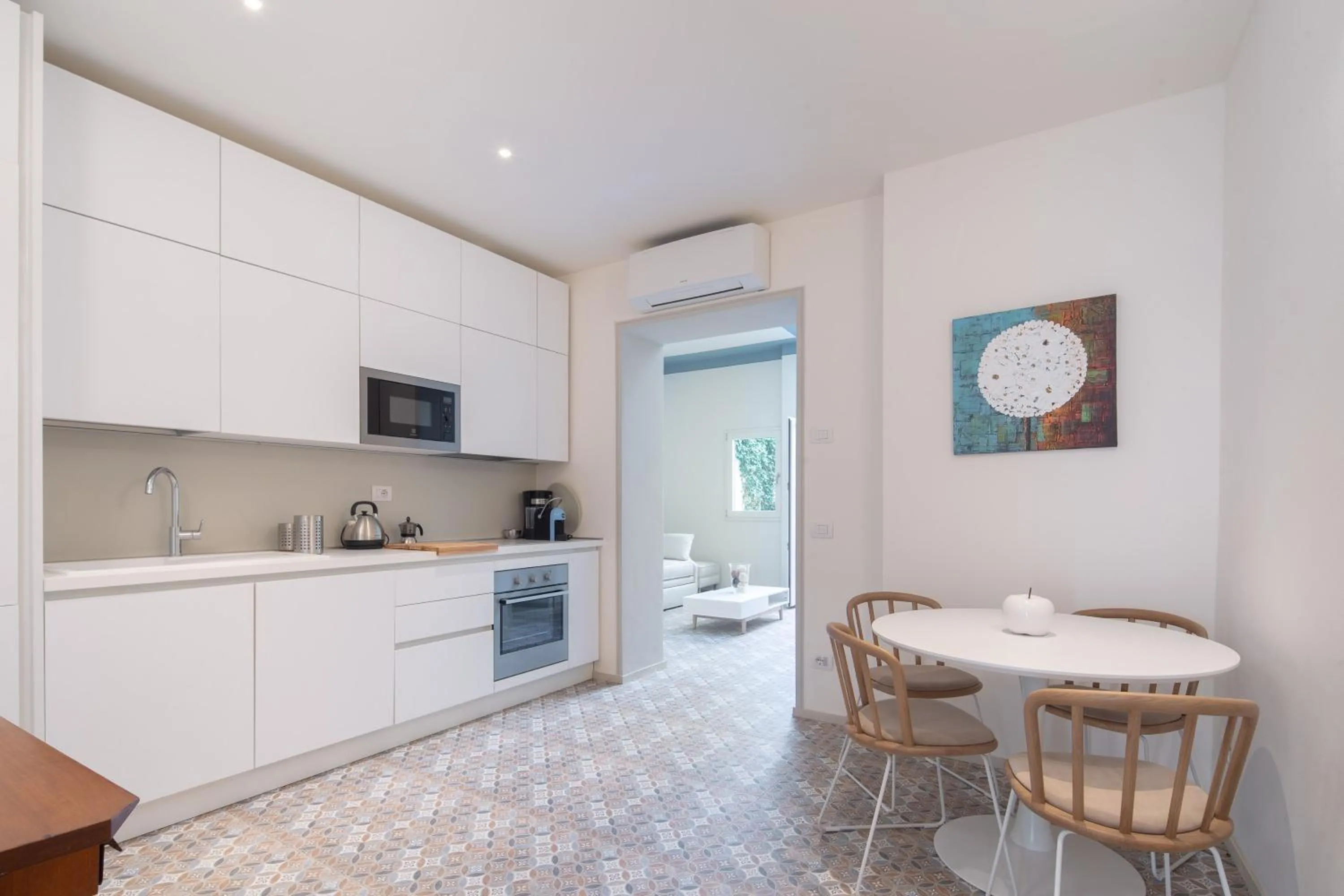 Kitchen or kitchenette in Carapelli Apartments