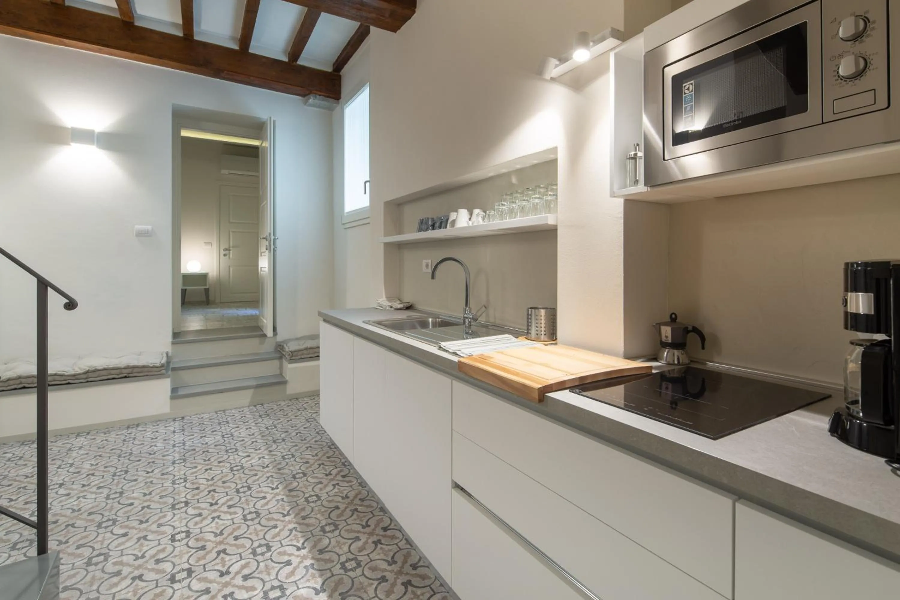Kitchen or kitchenette in Carapelli Apartments
