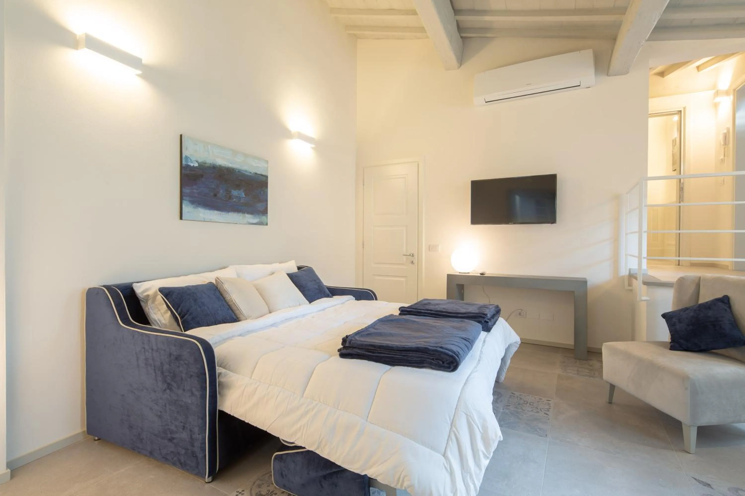 Living room, Bed in Carapelli Apartments