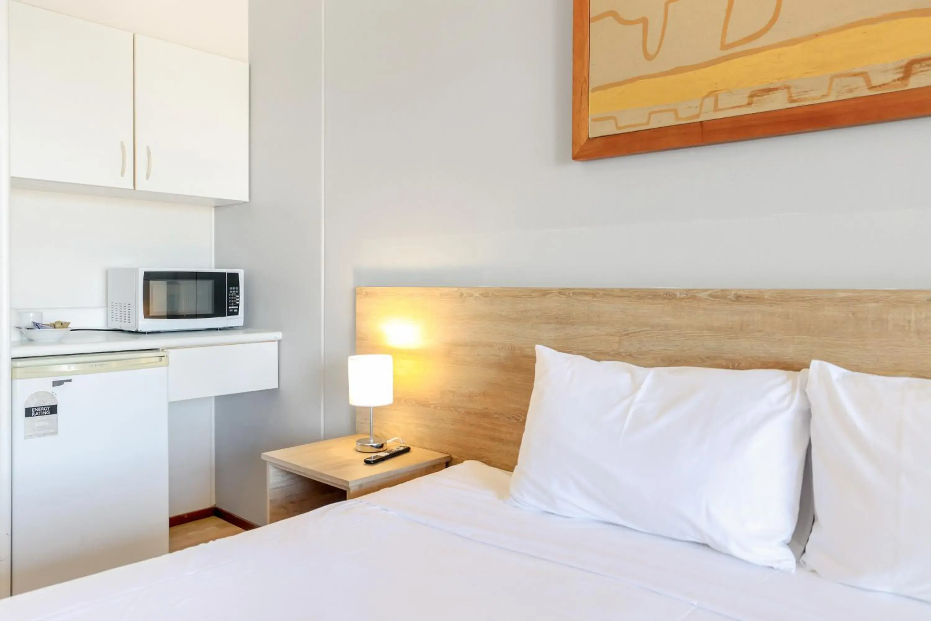 Coffee/tea facilities, Bed in Cullen Bay Resorts Coffee/tea facilities, Bed in Cullen Bay Resorts