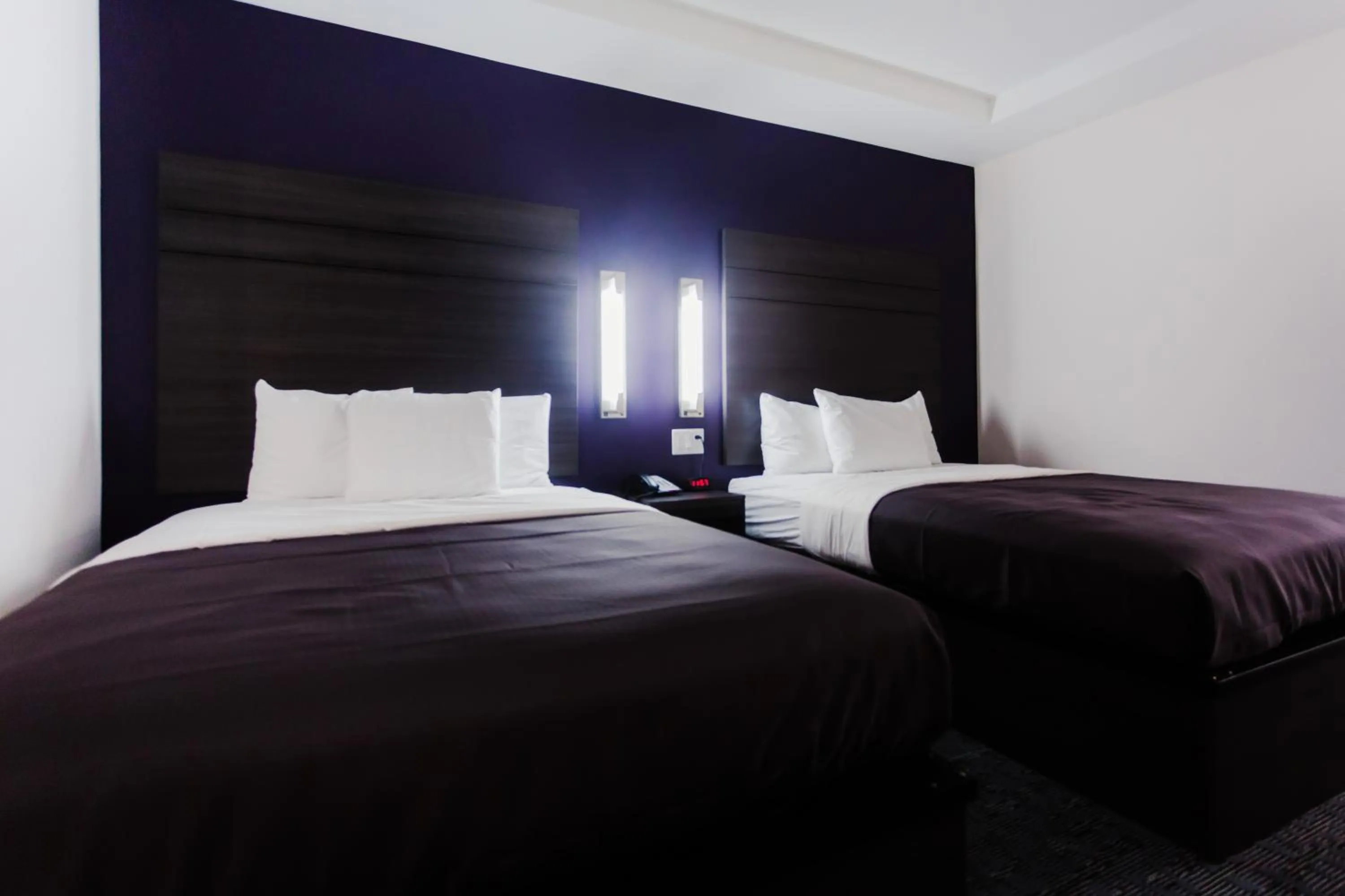 Bed in Palacio Royale Inn Boutique Katy