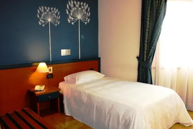 Bed in DOMUS Grand Hotel