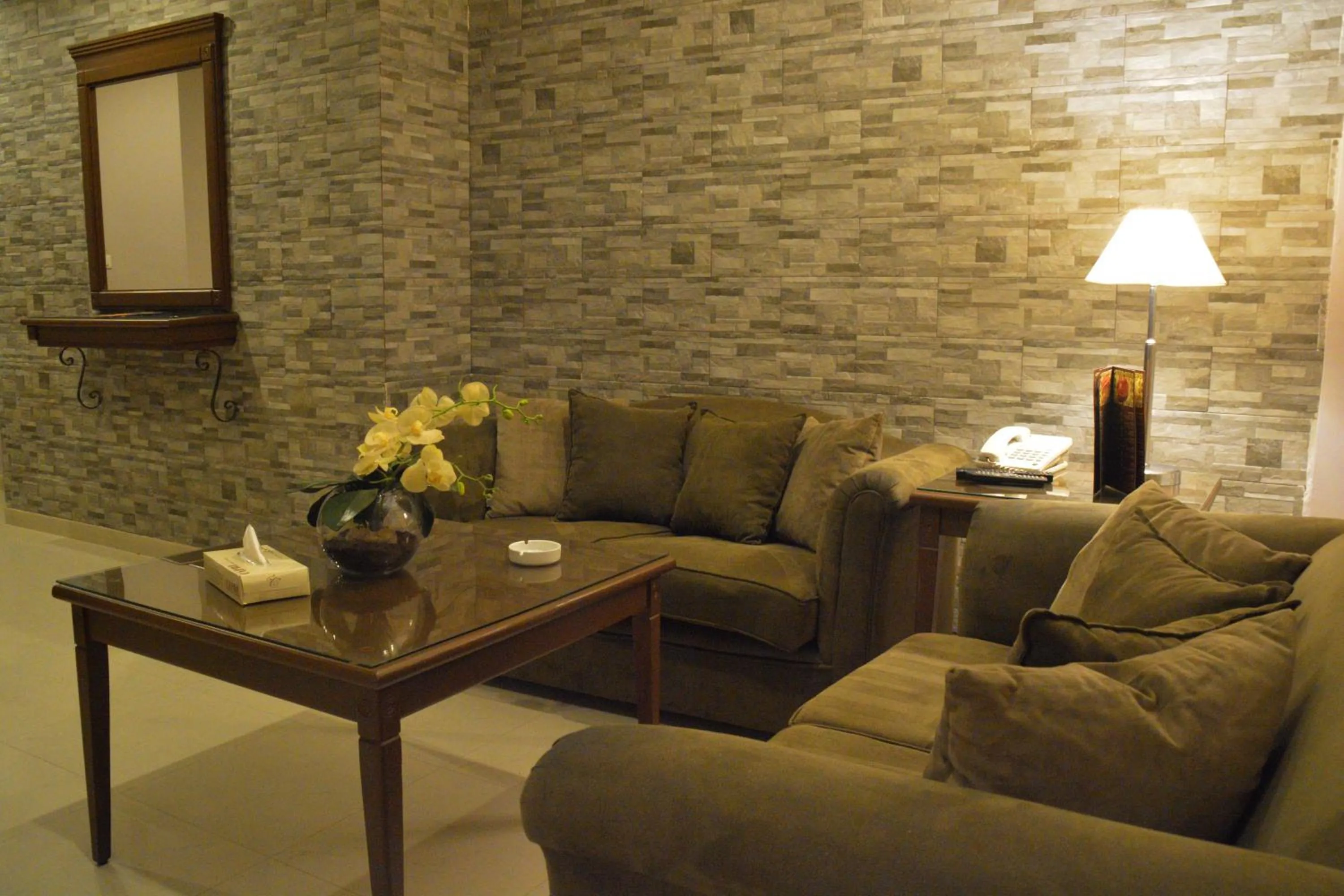 Living room in Capri Hotel Suites