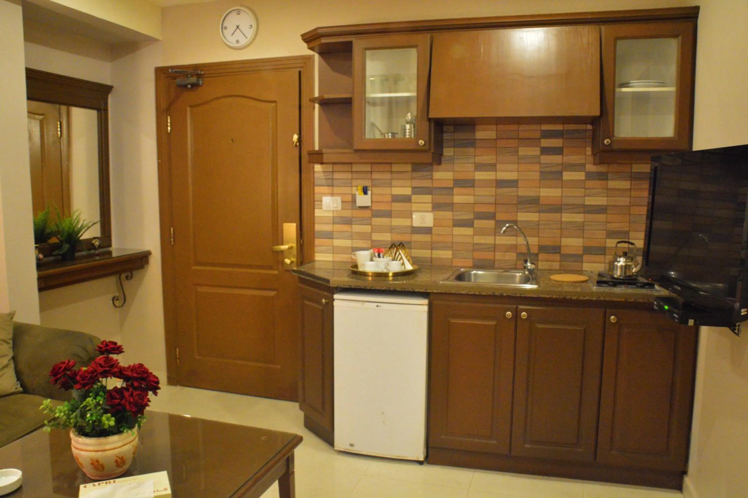 Kitchen or kitchenette in Capri Hotel Suites