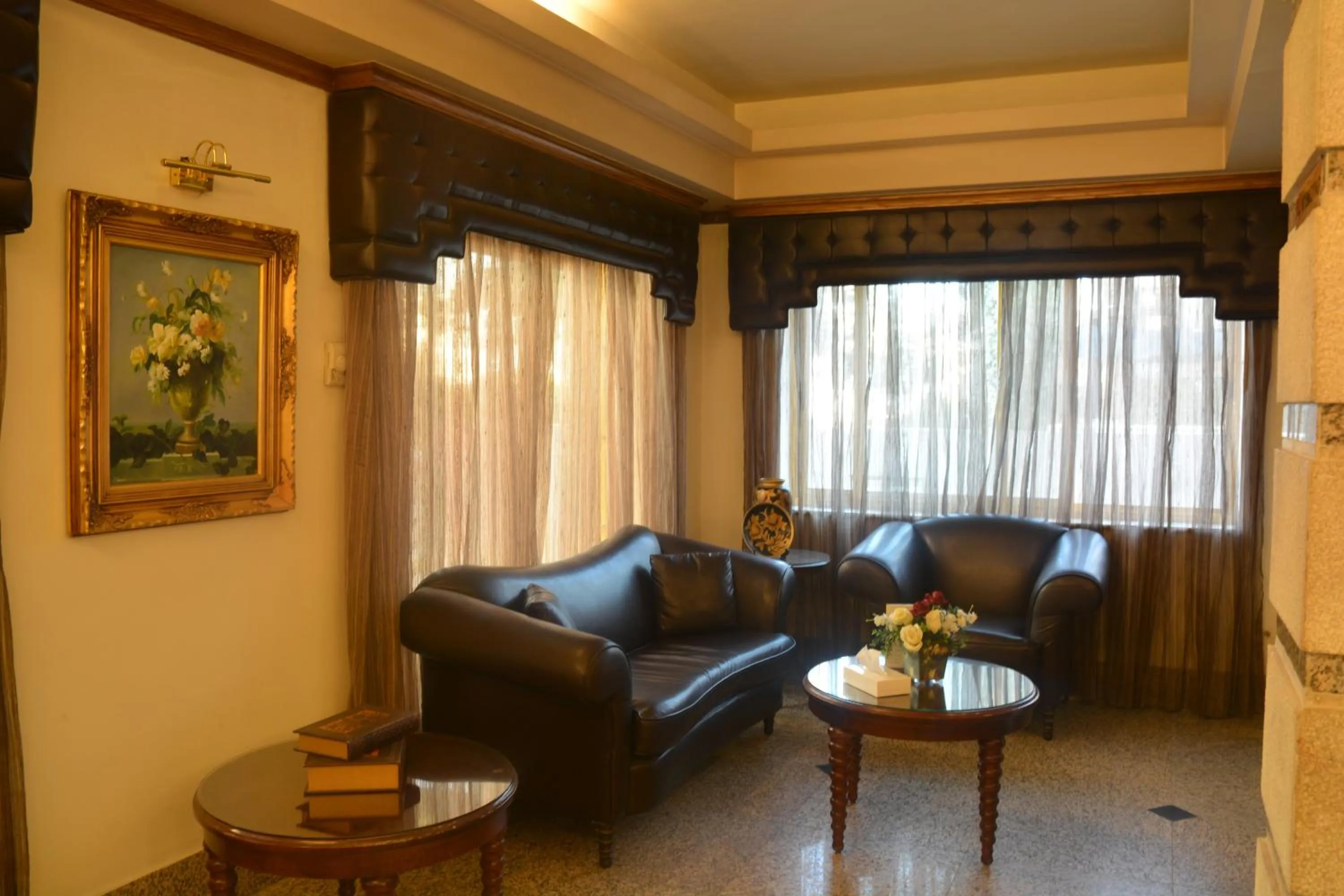 Lobby or reception in Capri Hotel Suites