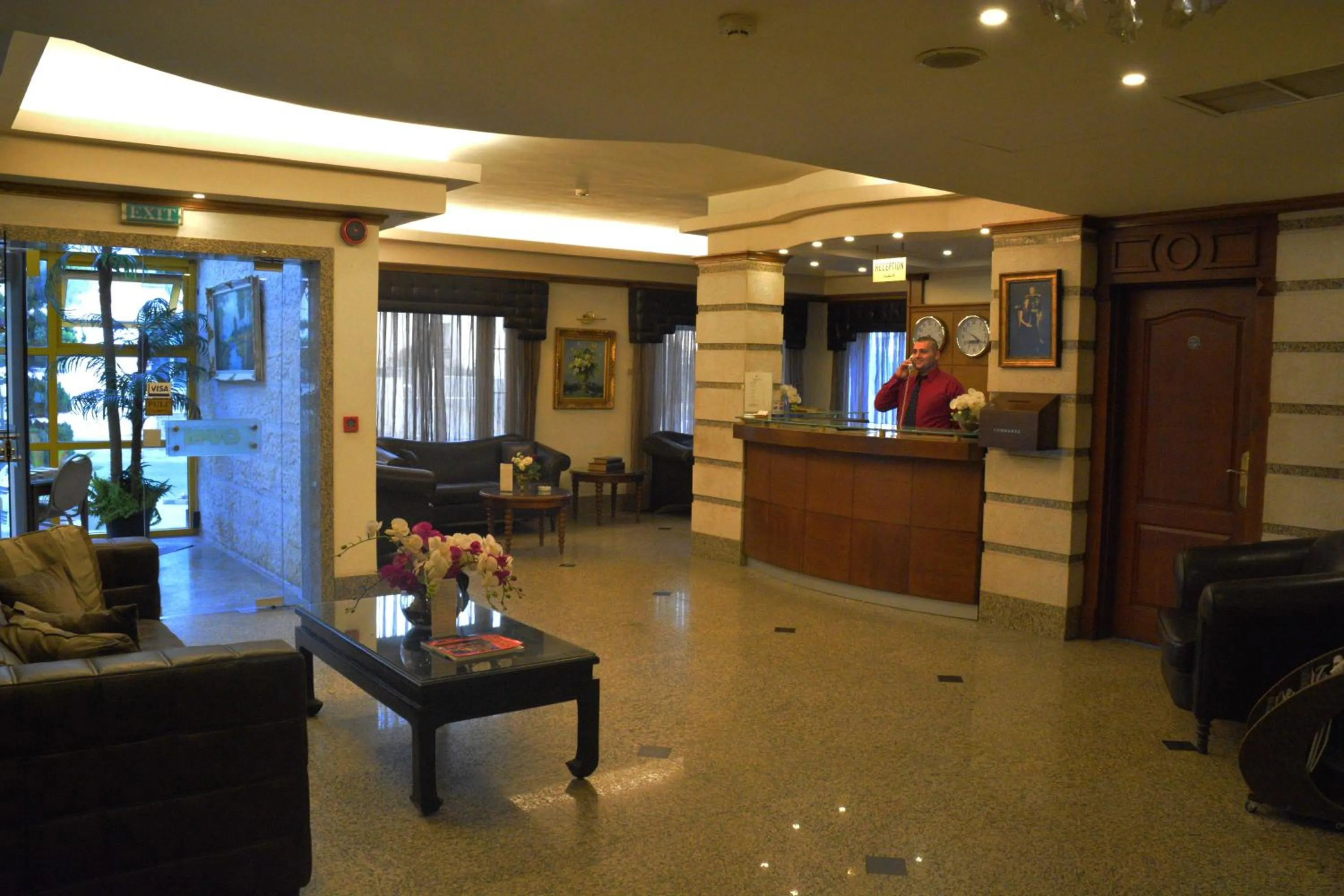 Lobby or reception in Capri Hotel Suites