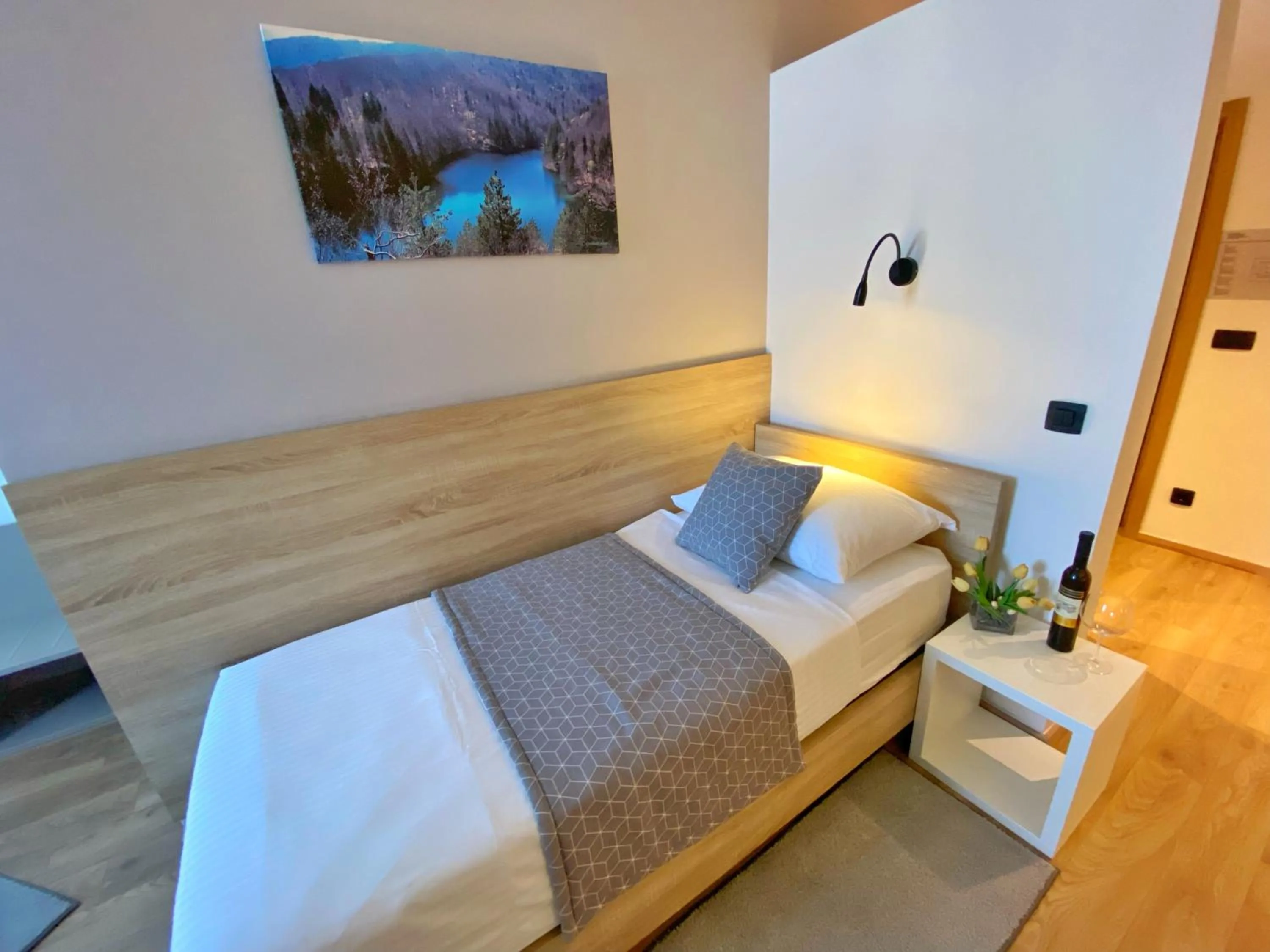 Bed in 16 Lakes Hotel