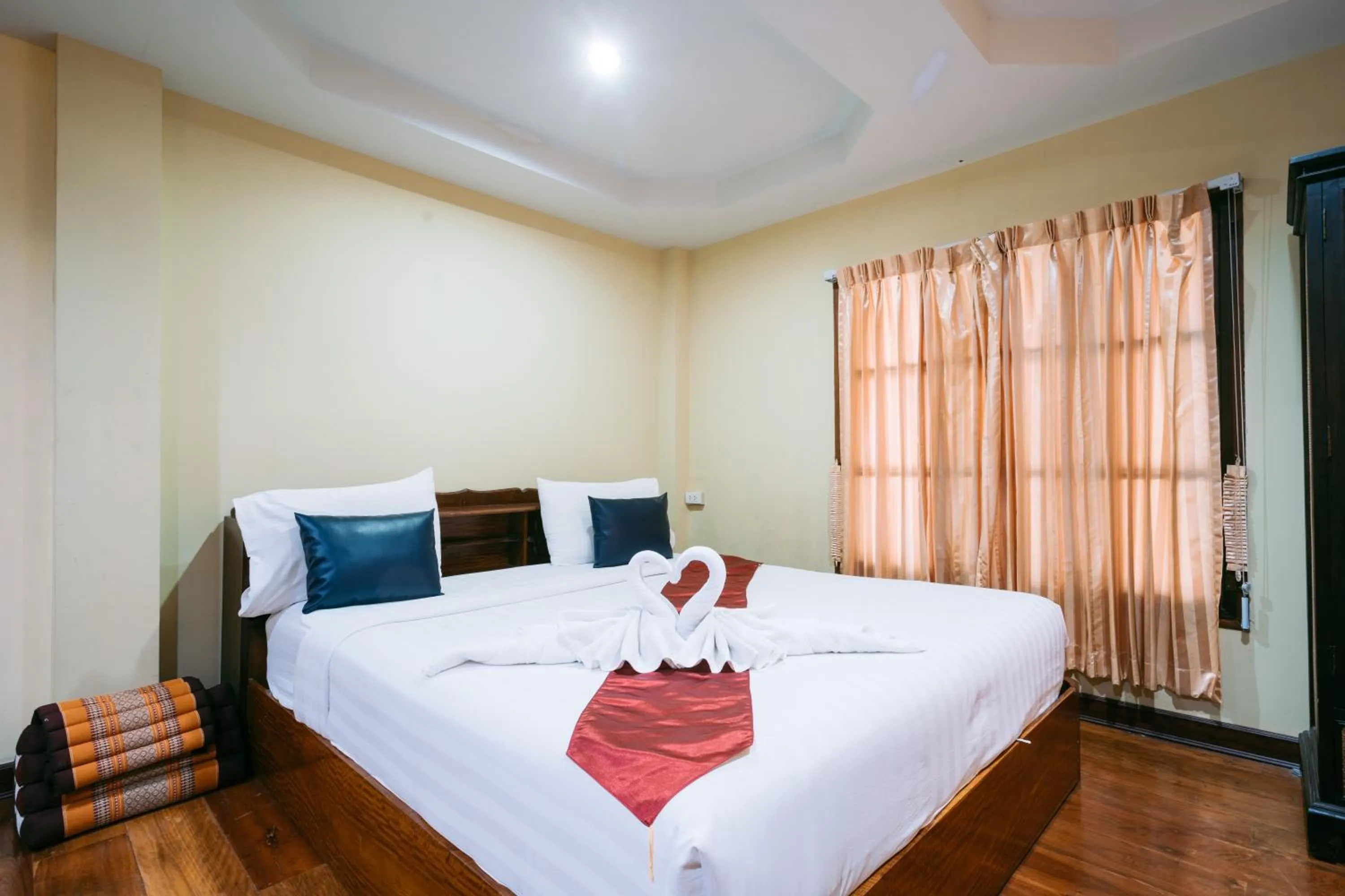 Bed in Jintana Resort