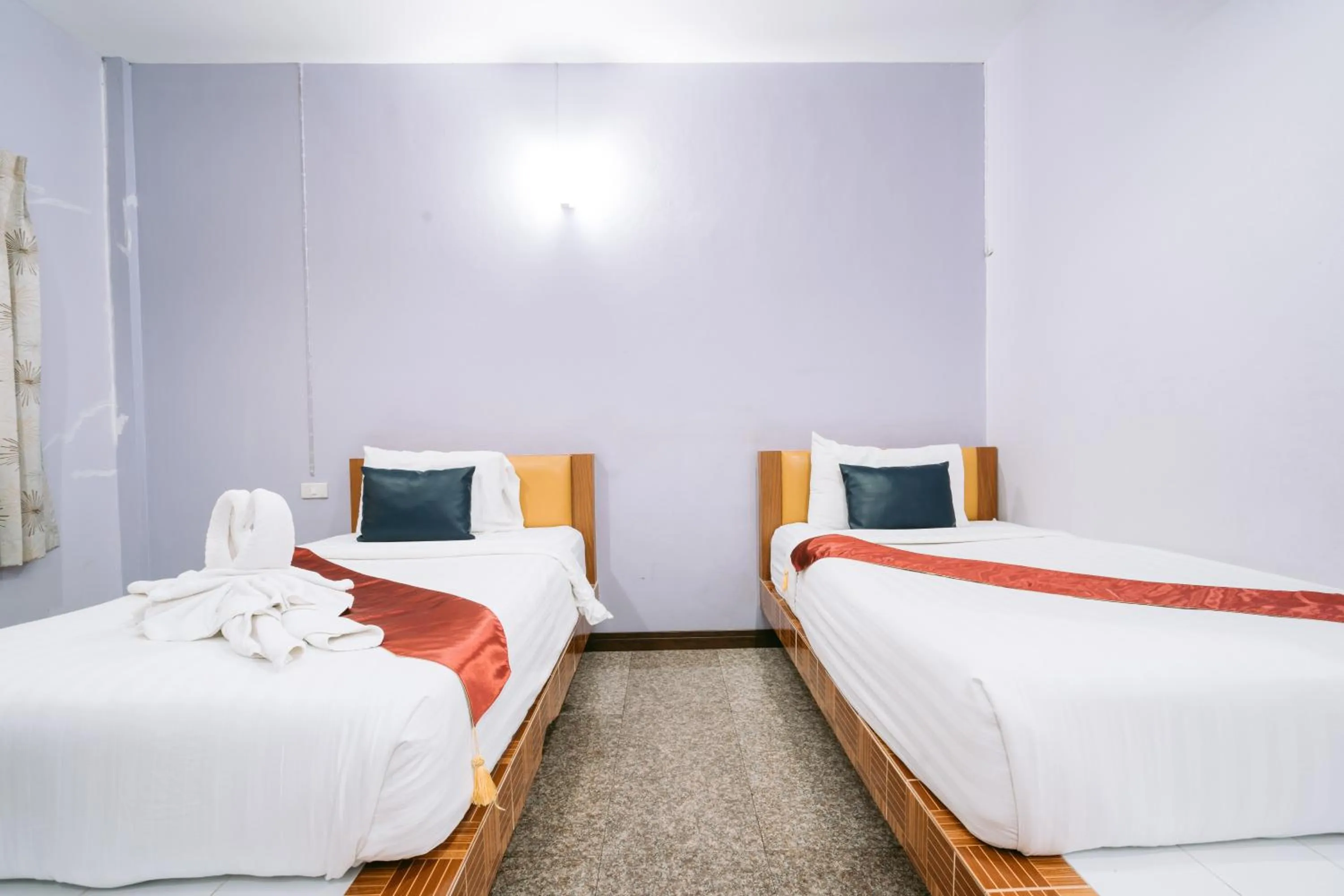 Bed in Jintana Resort