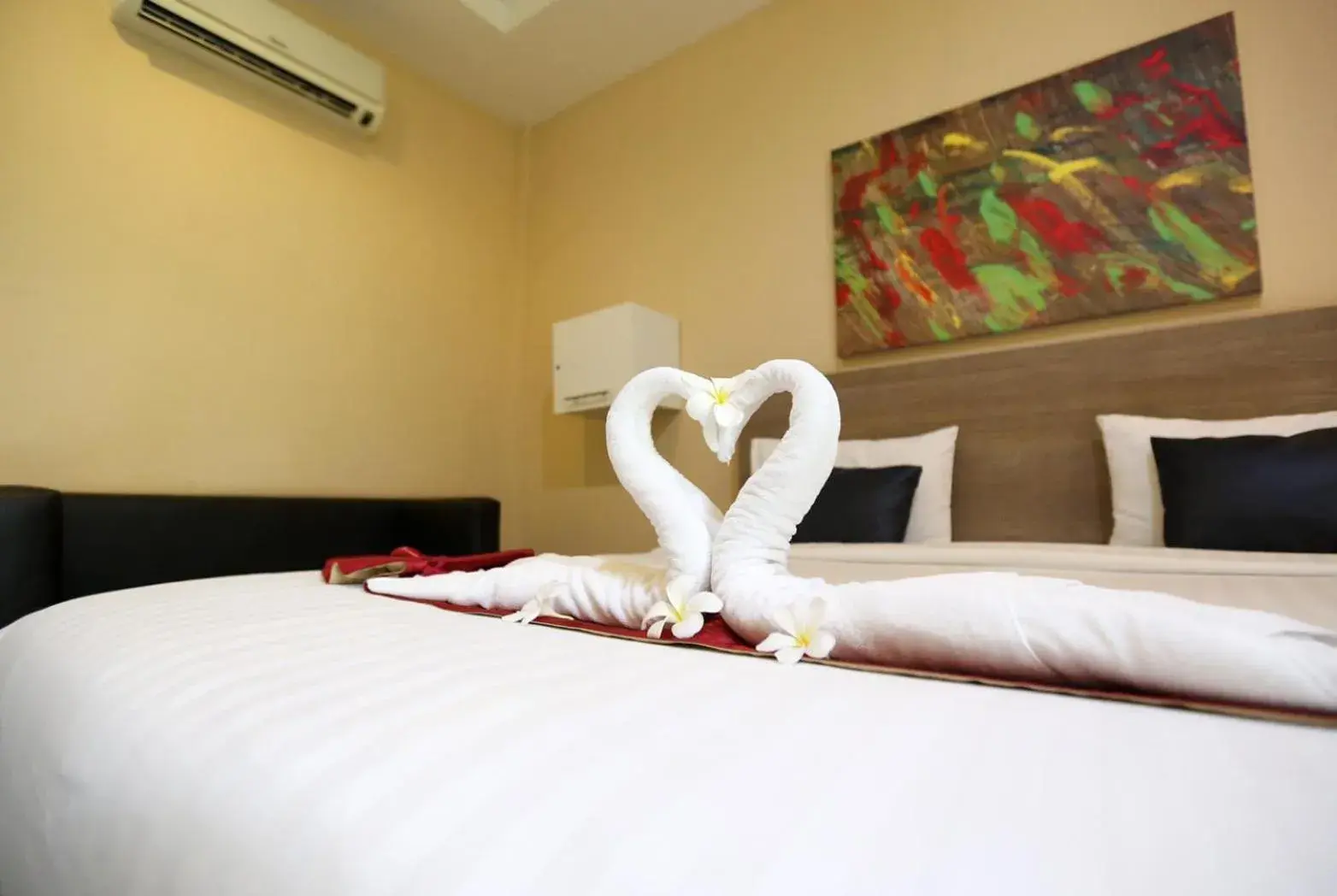 Bed in Jintana Resort Bed in Jintana Resort