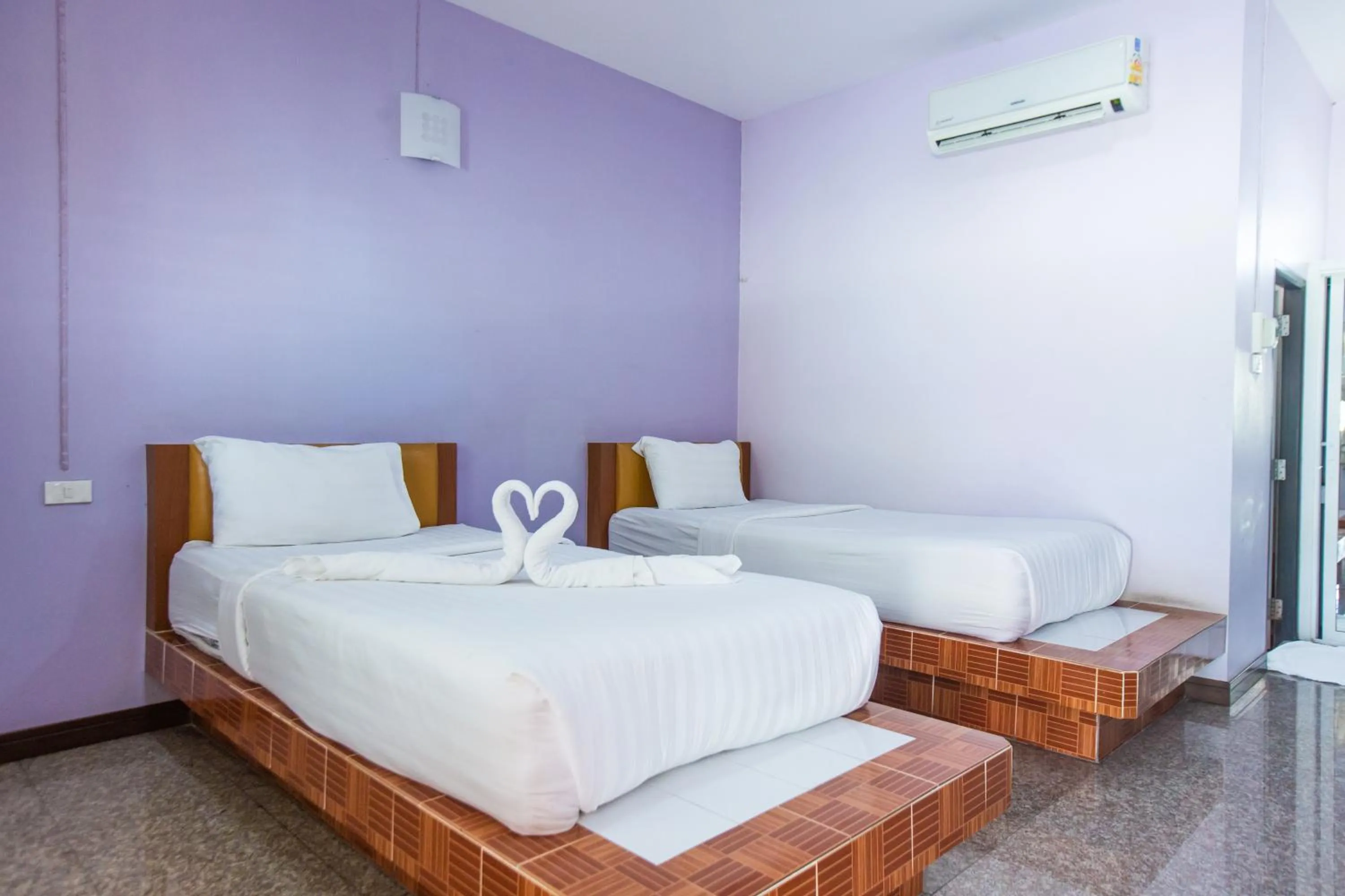 Bed in Jintana Resort