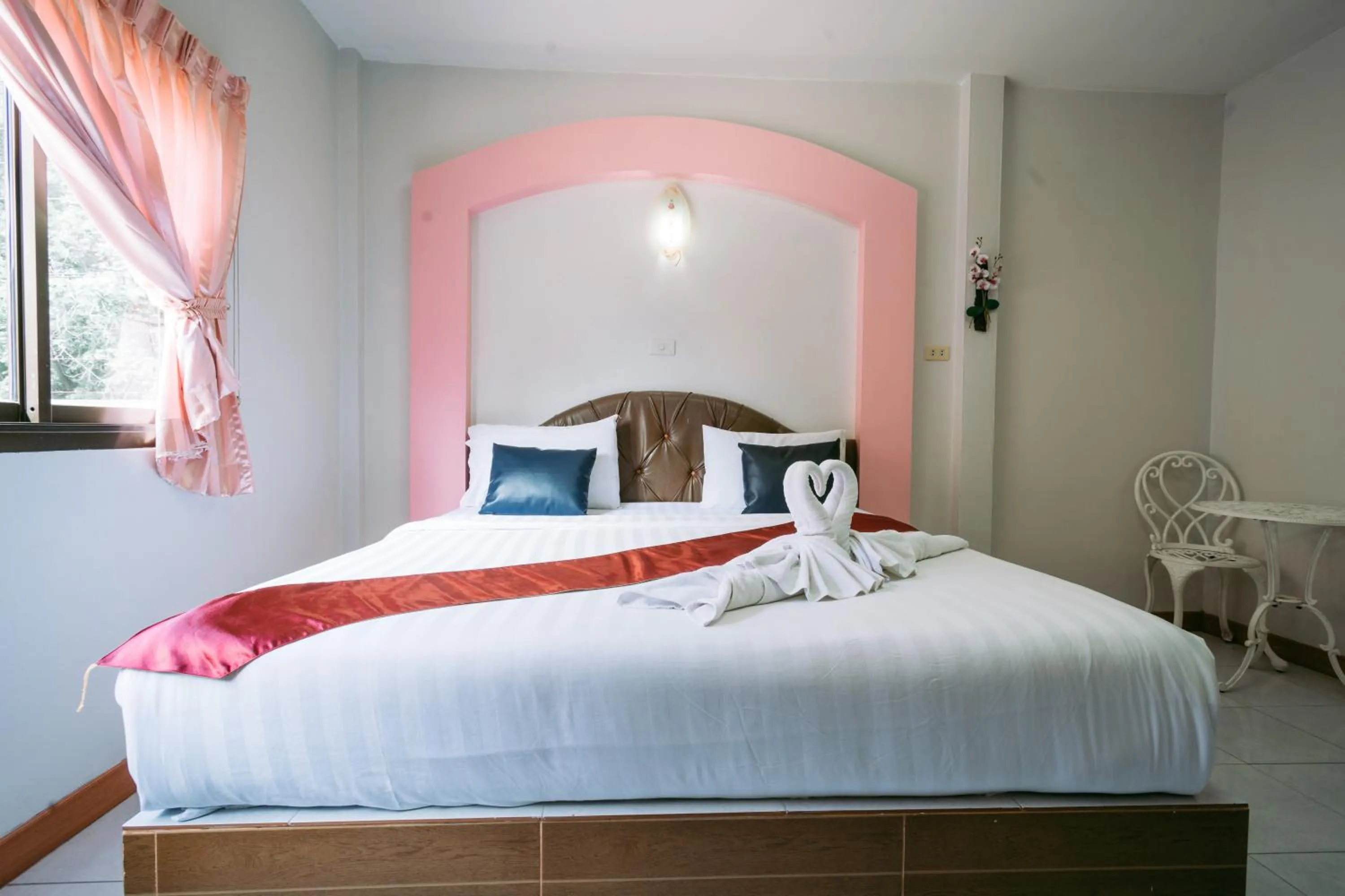 Bed in Jintana Resort